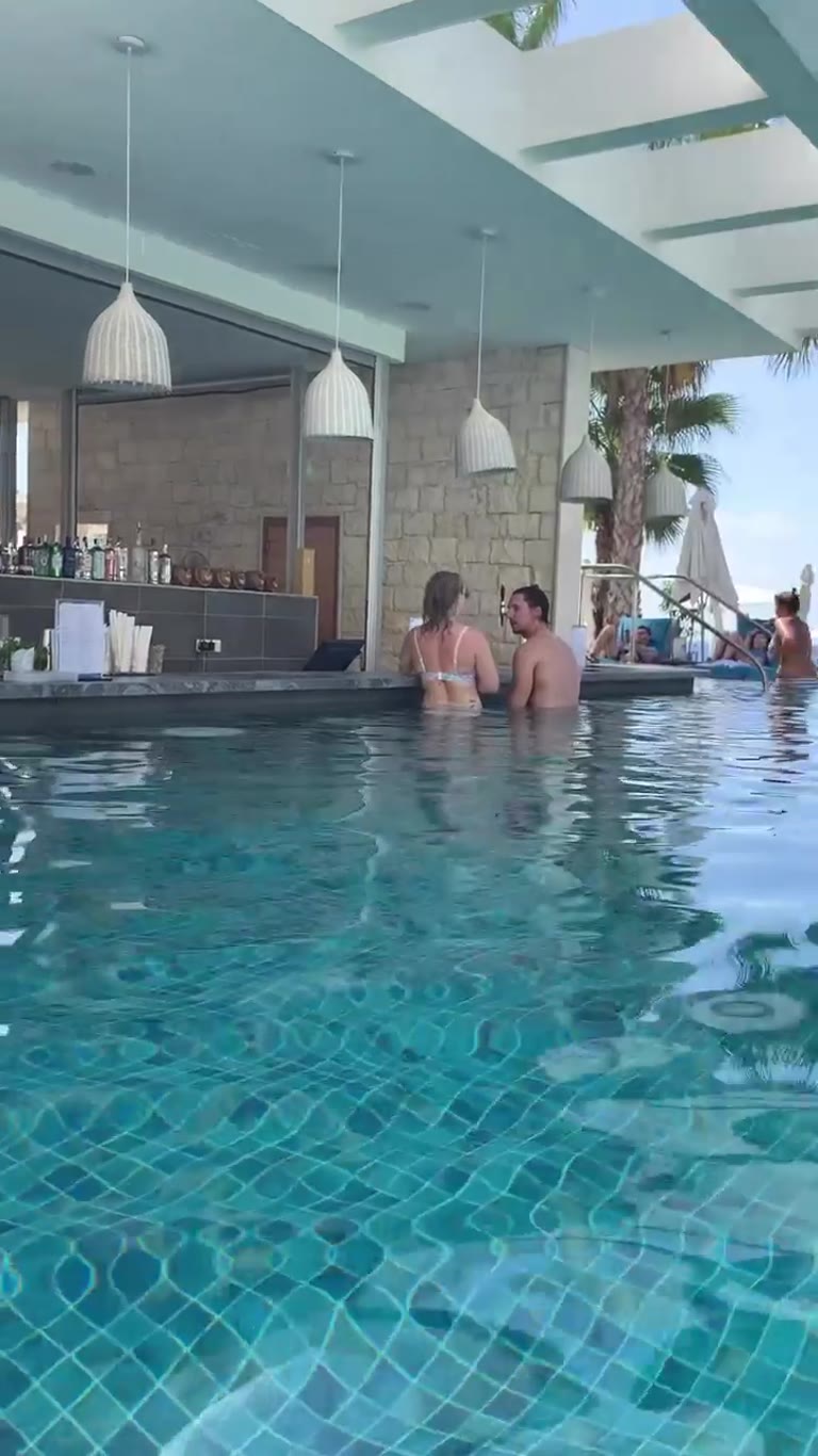 Resort pool with swim-up bar in Paphos