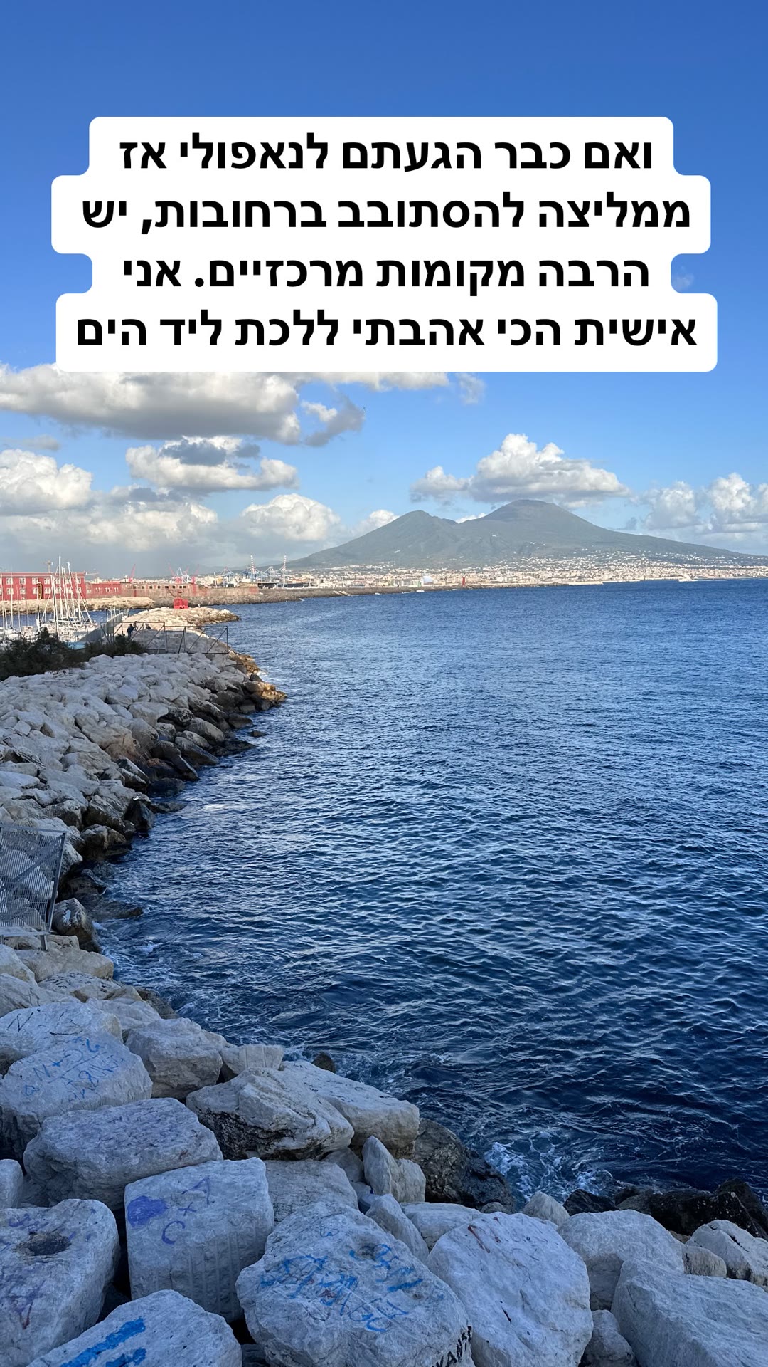 Walking Naples' seafront with Vesuvius in view