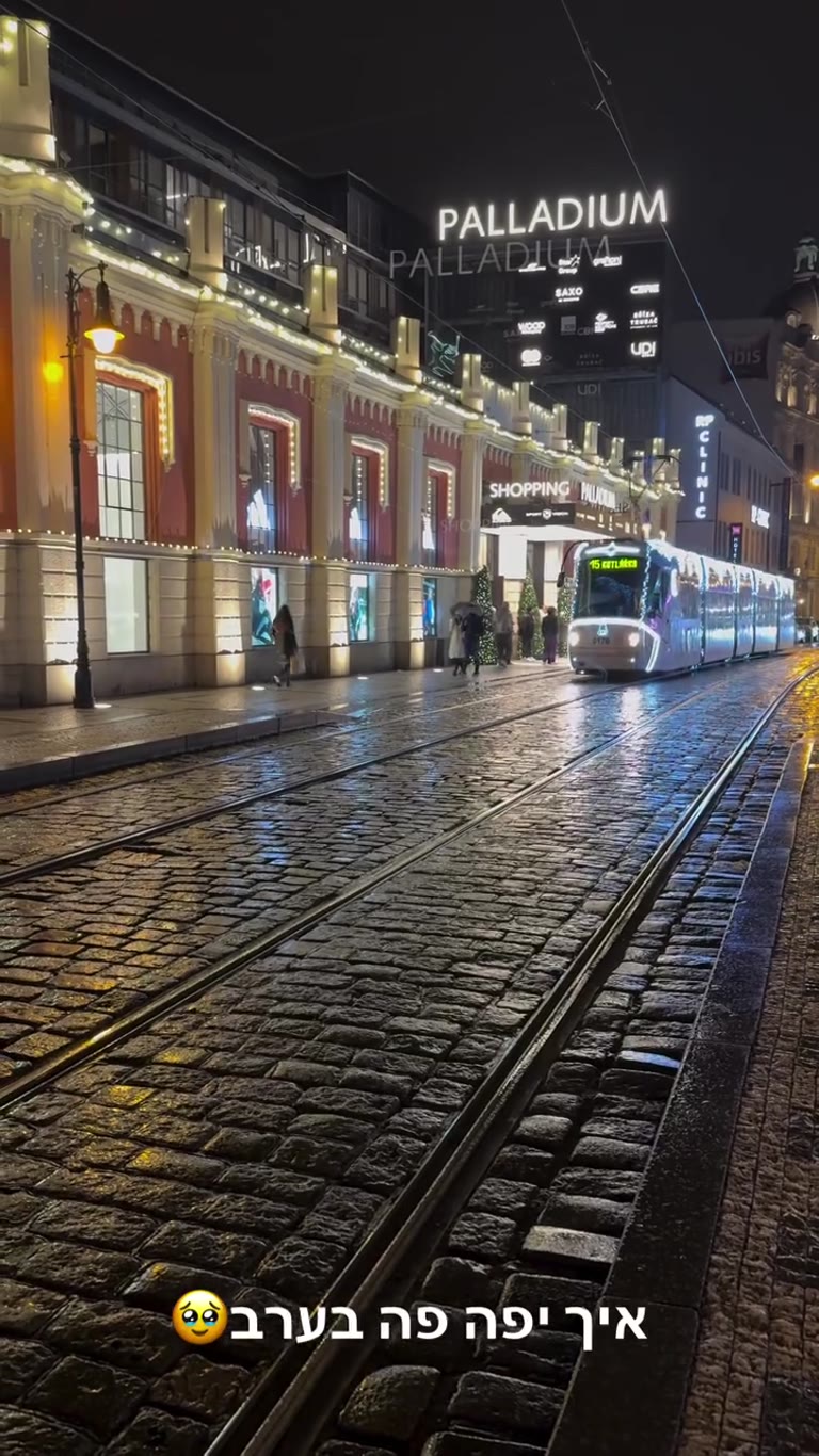 Christmas tram passing Palladium, Prague