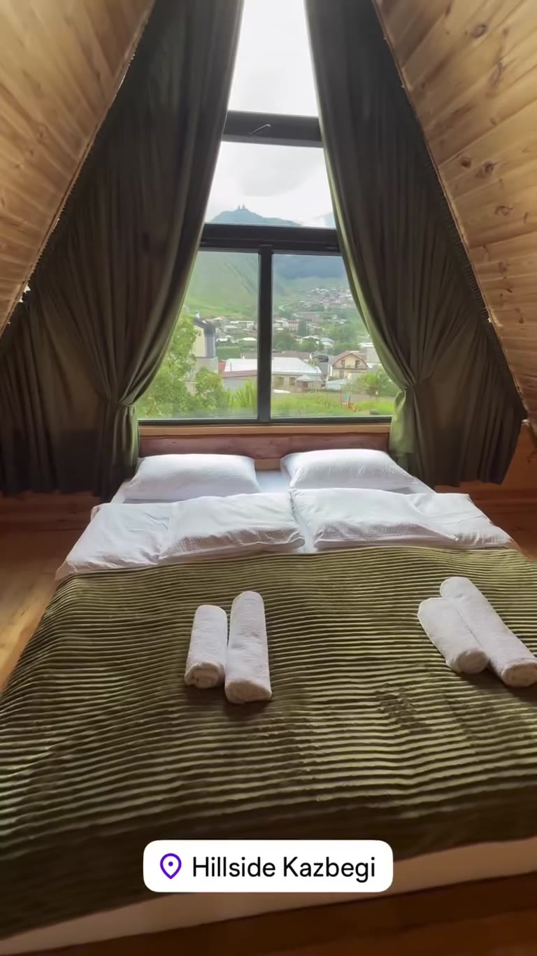 Hillside Kazbegi cabins with Mount Kazbek views