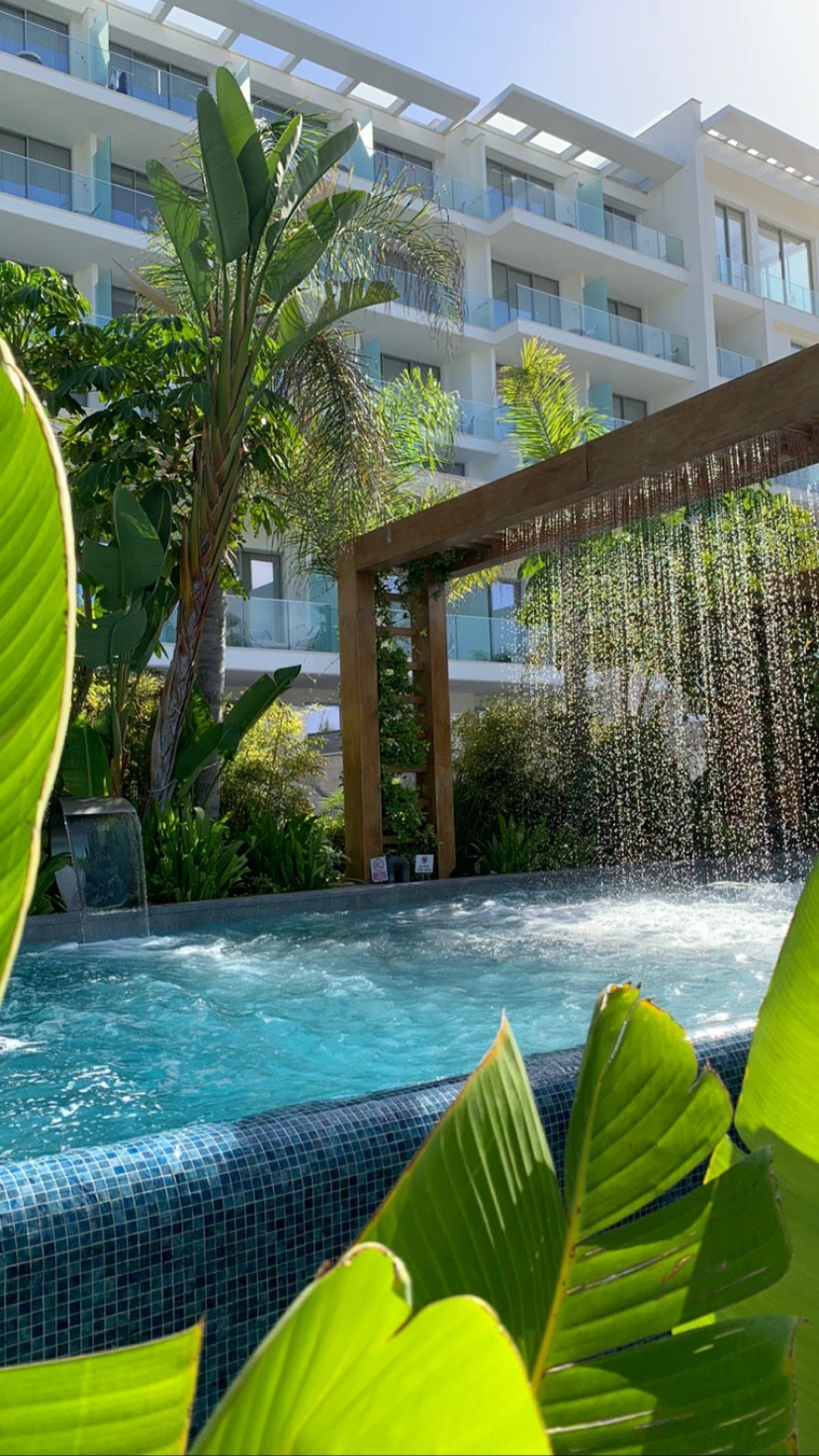 Hotel pool with waterfall in Paphos