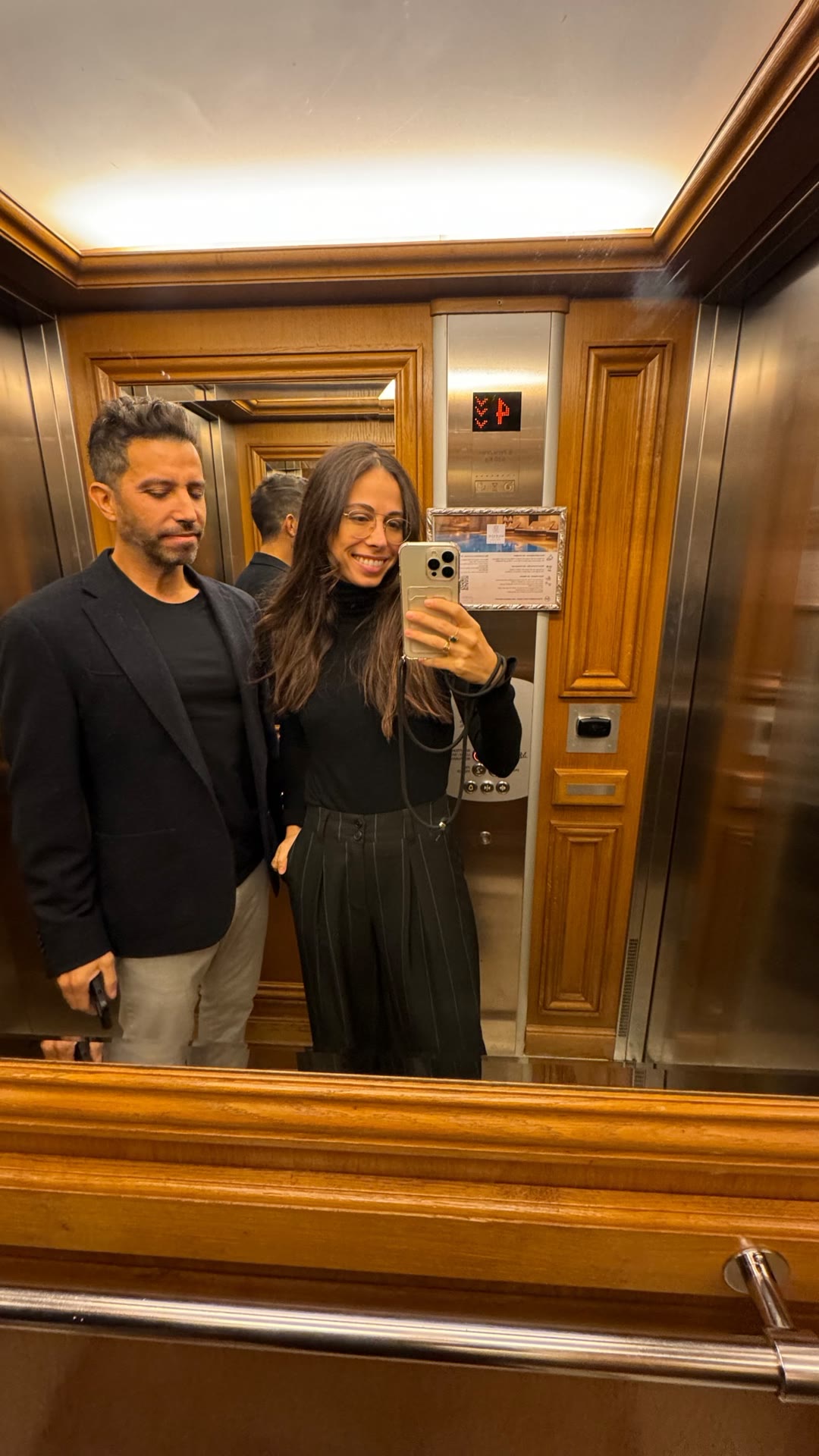 Elevator mirror selfie in Paris