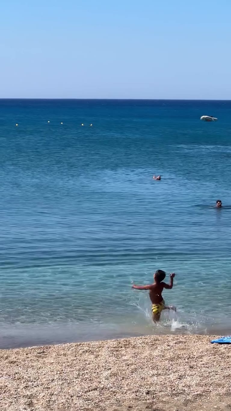 Swimming at a beach on Milos