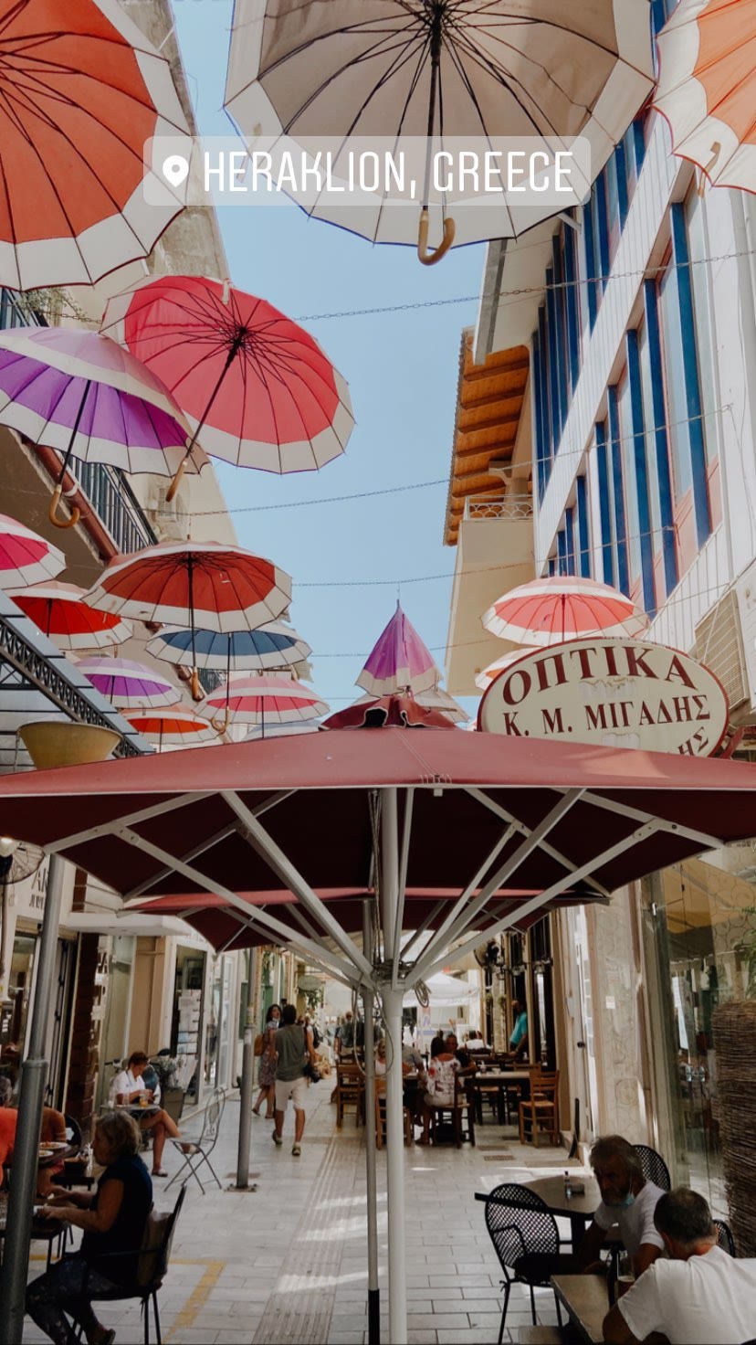 Heraklion's umbrella-covered café alley