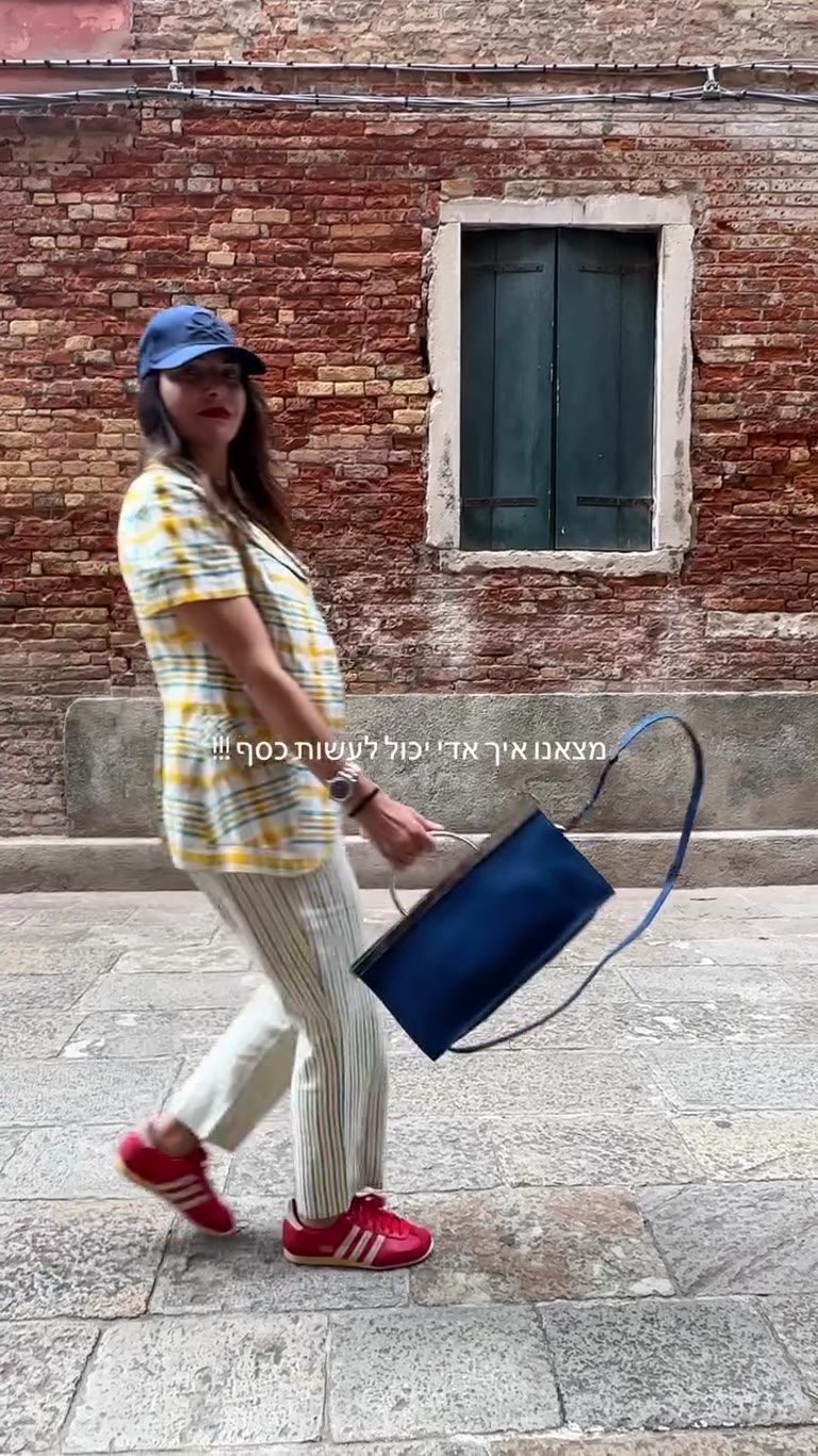Walking a Venice alley with a joke about Adi