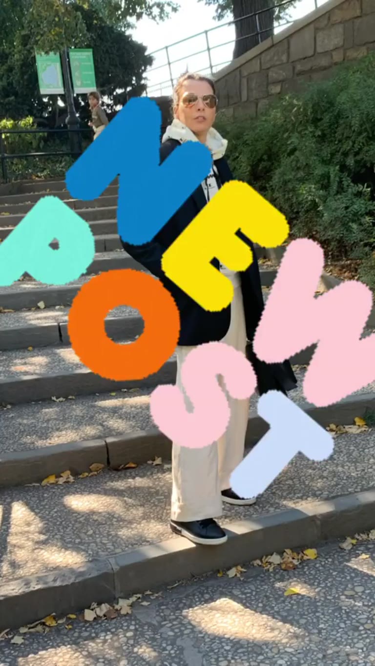 "New post" teaser on NYC park steps