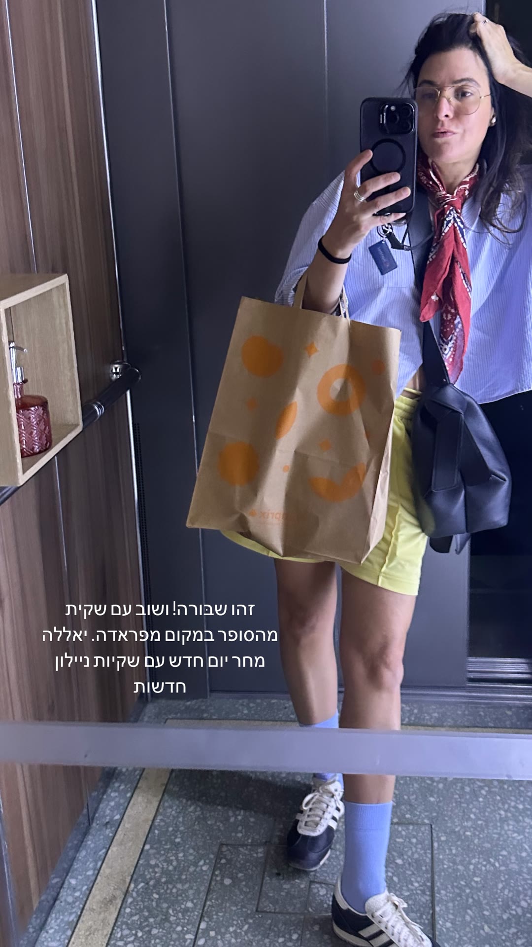 Elevator selfie with a supermarket bag in Paris