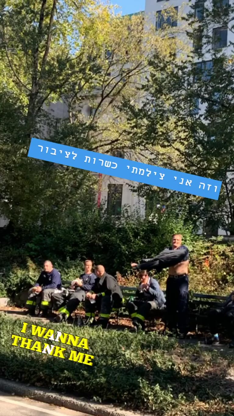 Firefighters on a NYC park bench