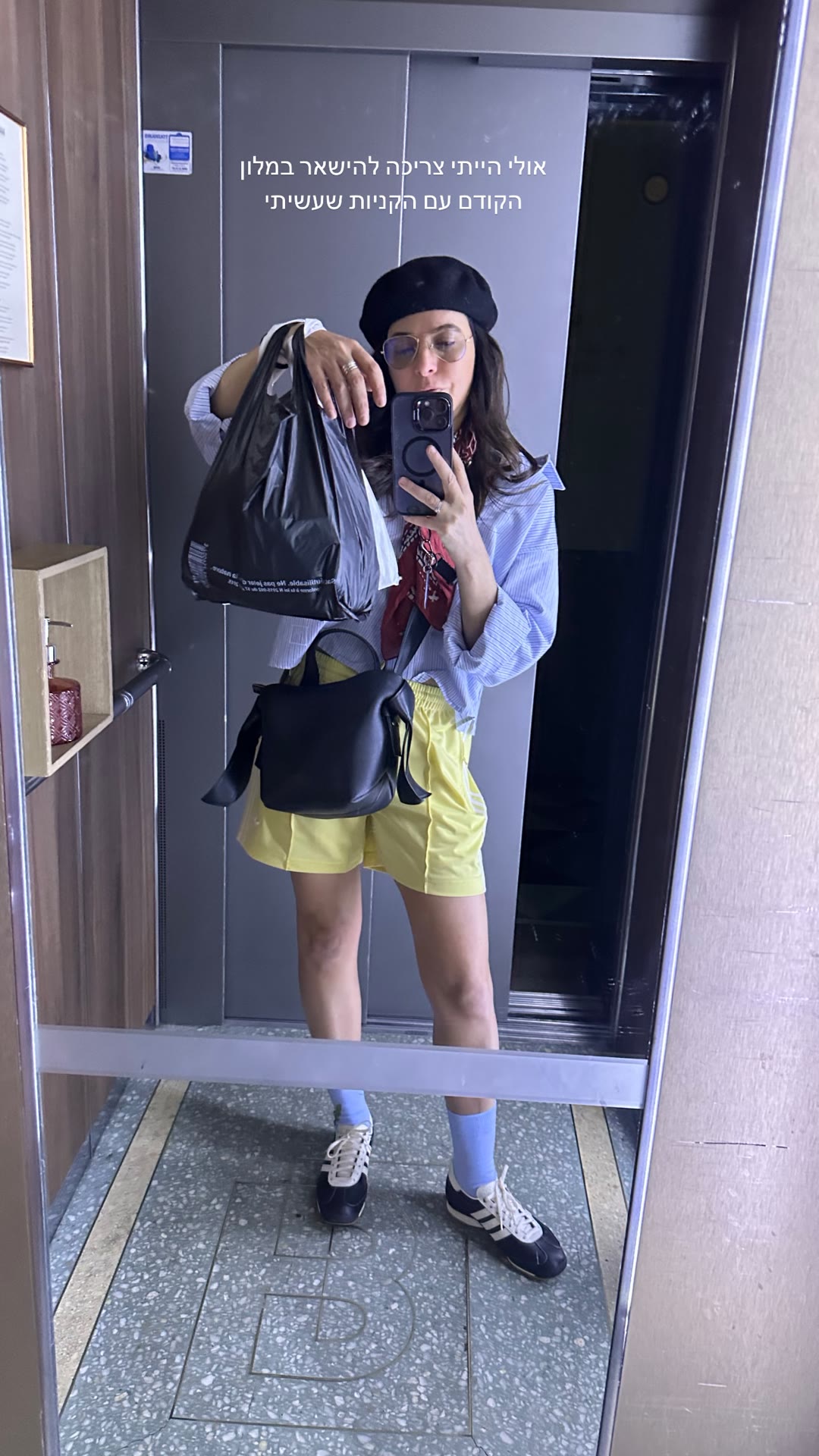 Shopping haul in a Paris hotel elevator