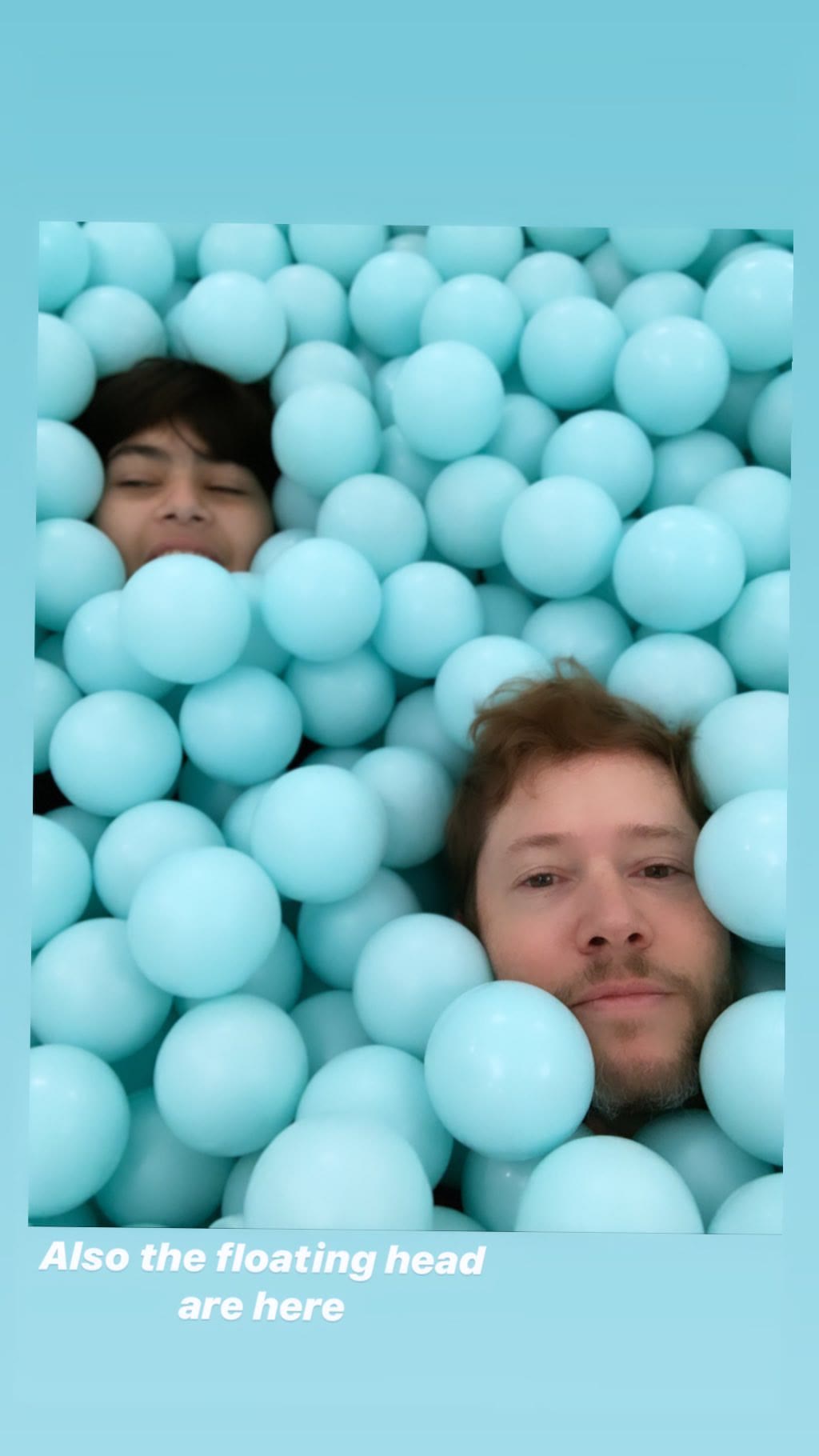 Floating heads in a giant ball pit, NYC