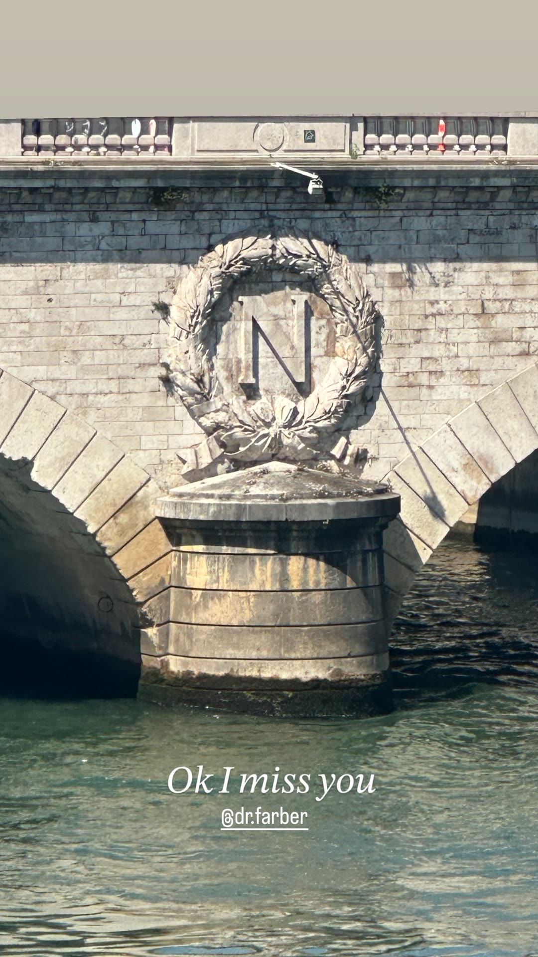 Napoleon's "N" on a Seine bridge, Paris