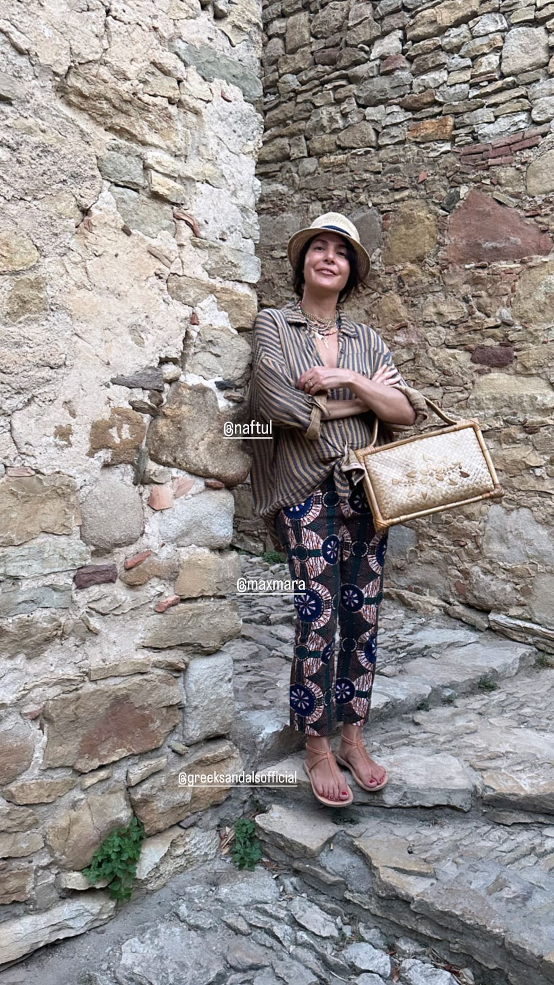 Outfit shot in a Spanish stone alley
