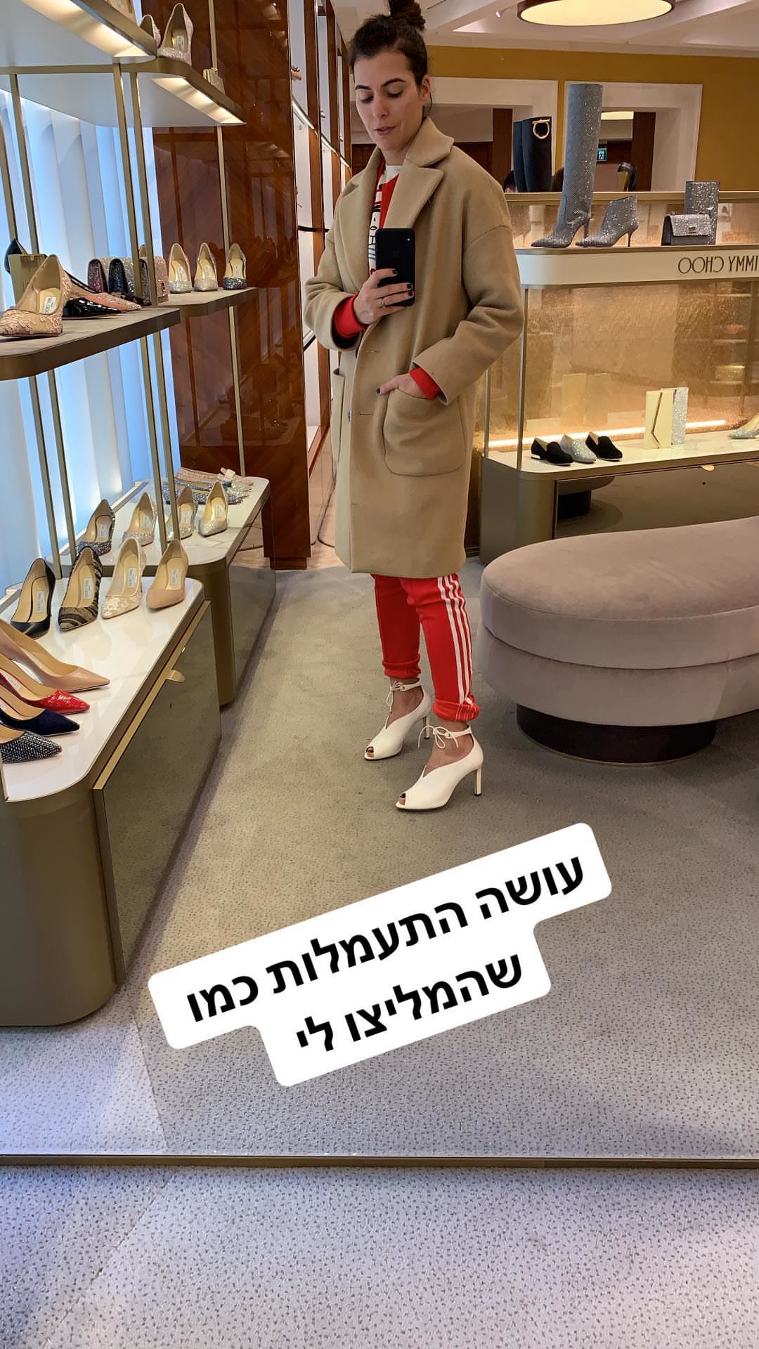 Jimmy Choo store mirror selfie in Rome