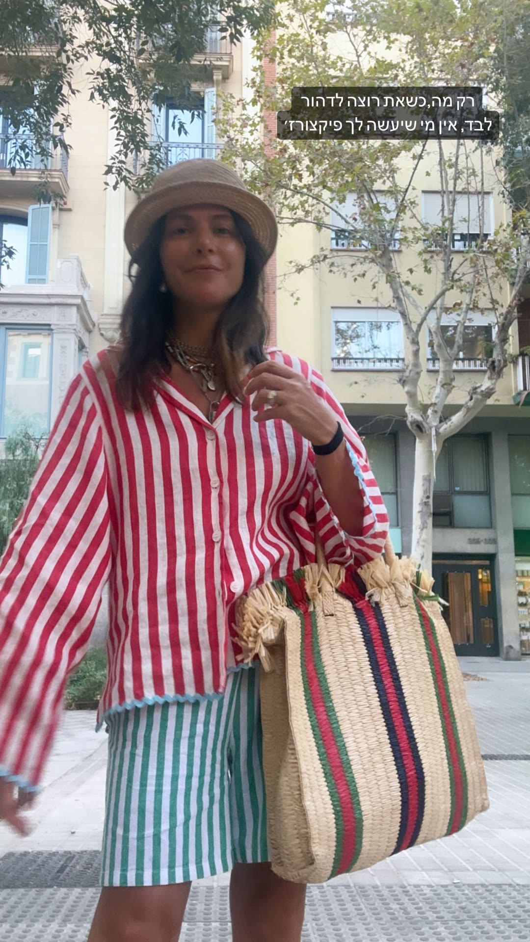 Solo travel style in Spain — striped set and straw bag