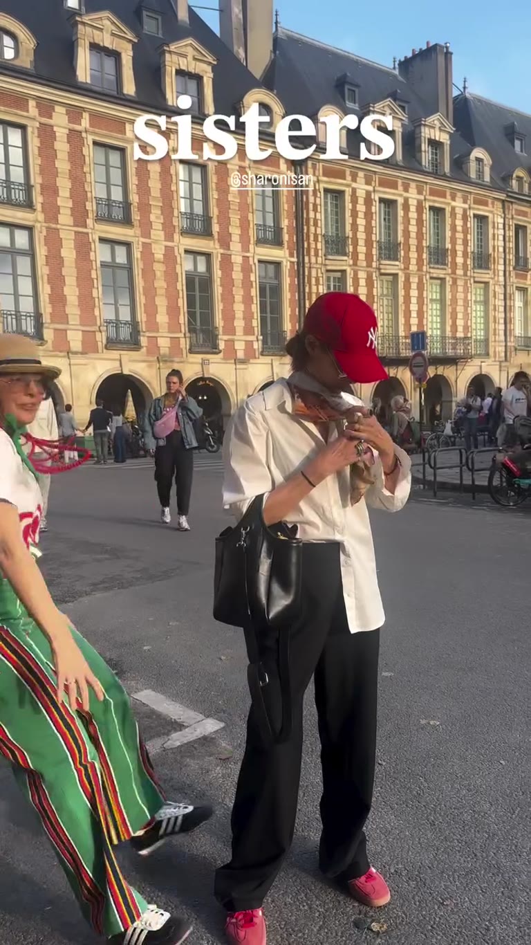 "Sisters" moment at Place des Vosges, Paris