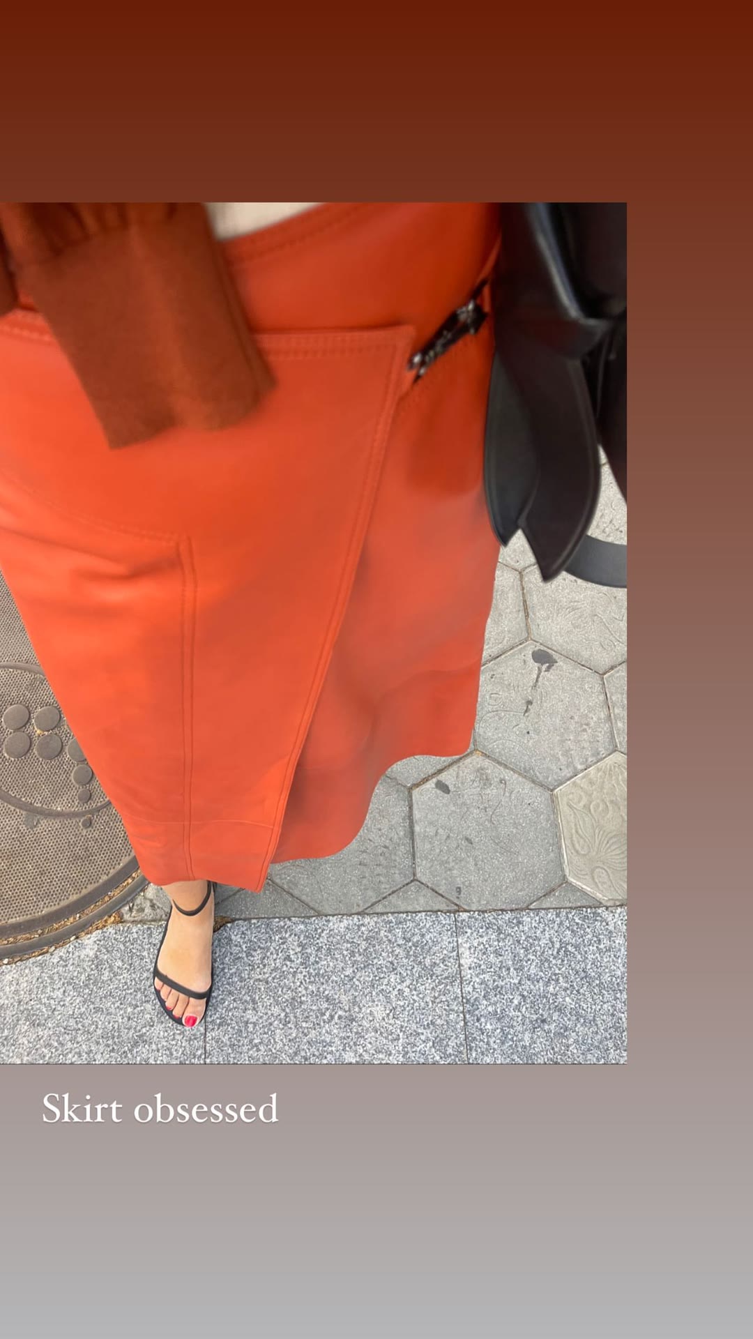 Orange leather skirt outfit in Barcelona