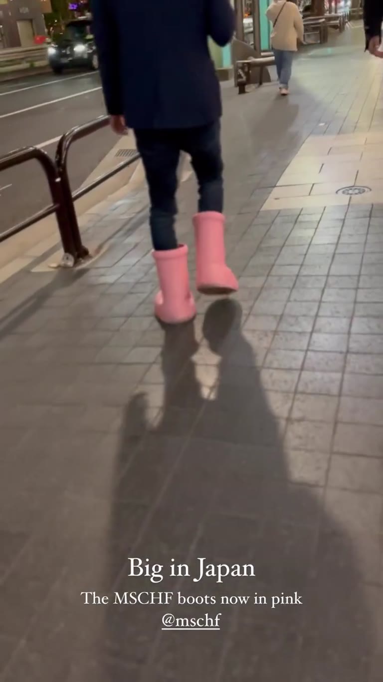 Pink MSCHF Big Boots on the streets of Tokyo