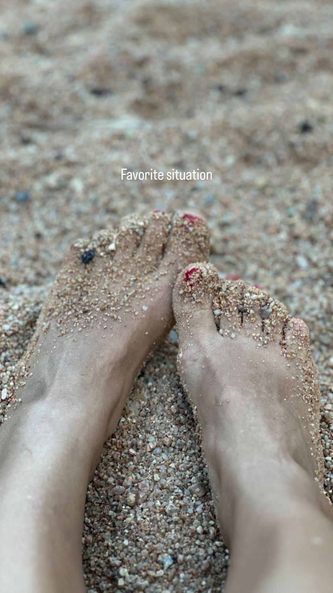 Sandy feet on a Spanish beach