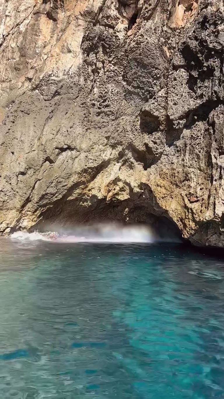 Rainbow in a sea cave on the Puglia coast