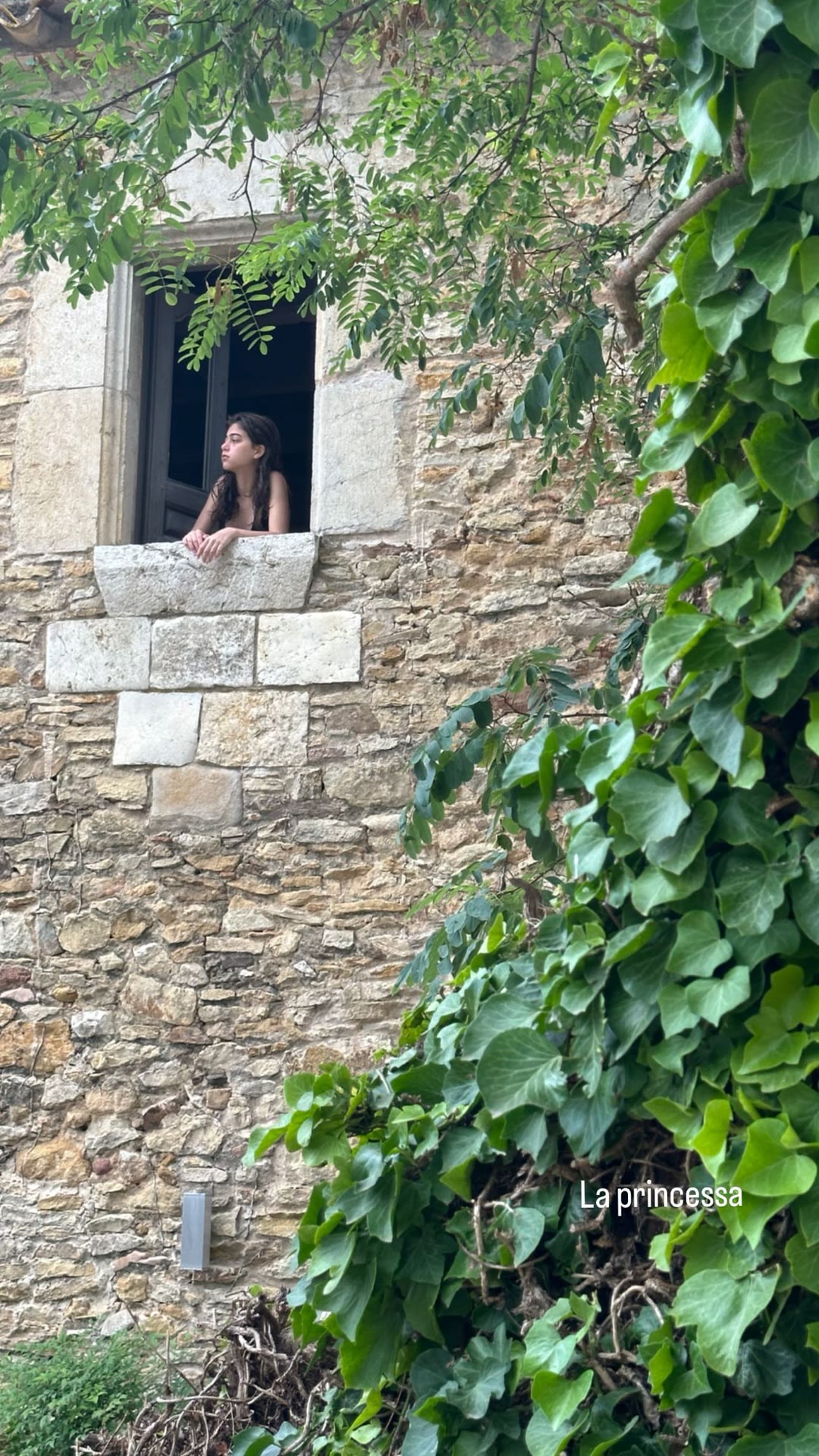 "La princessa" at a stone-walled window in Spain