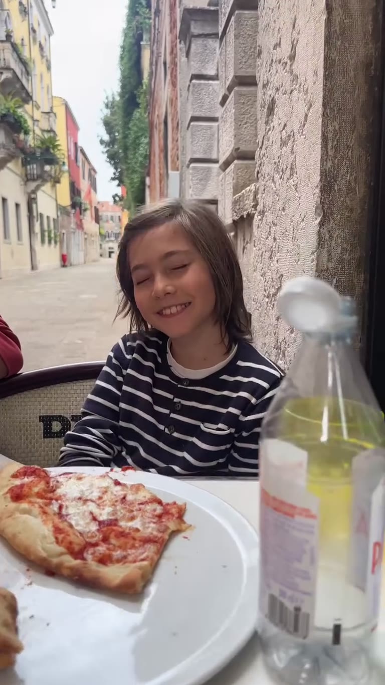 Pizza at an outdoor table in Venice