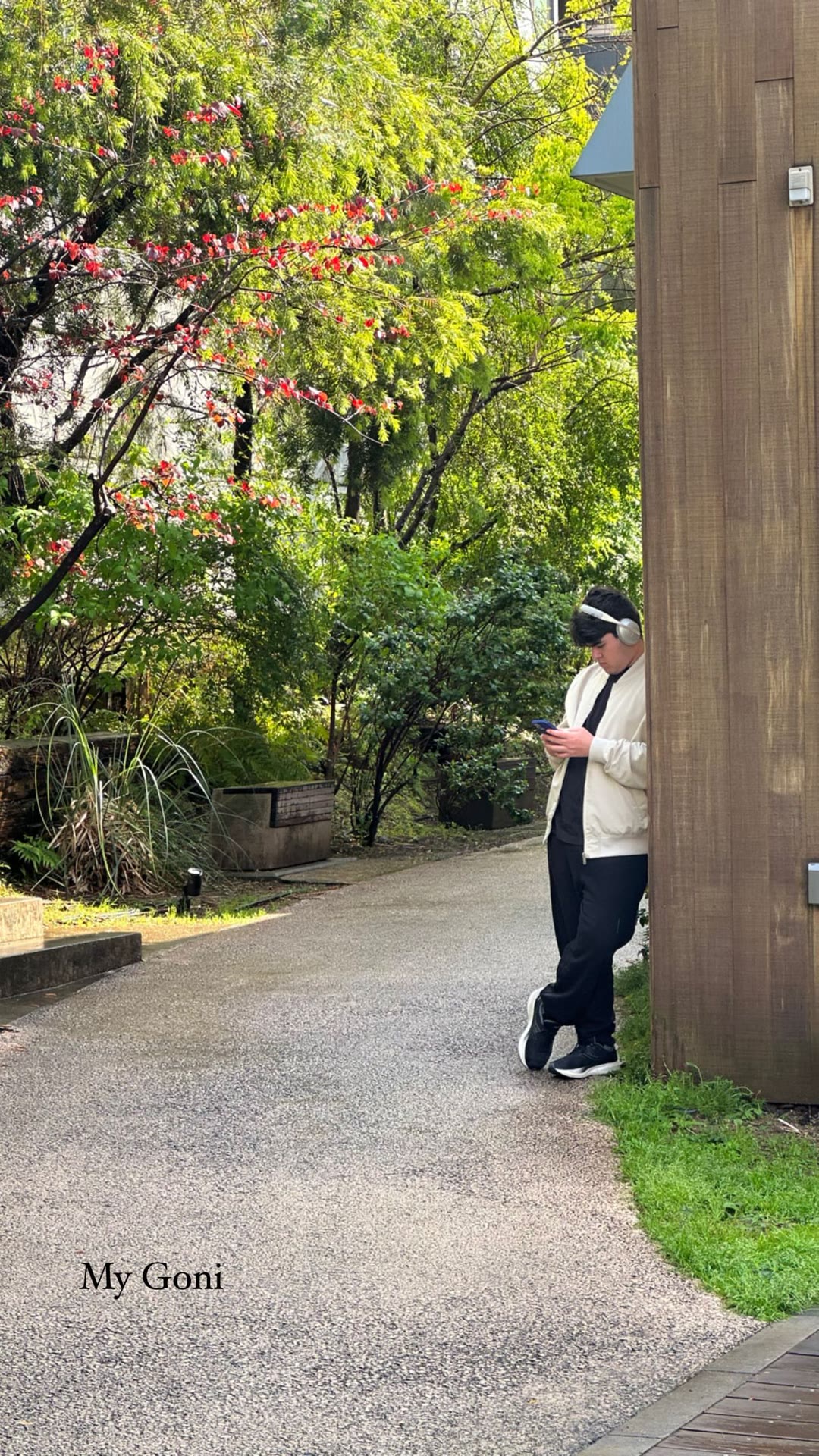 "My Goni" waiting on a Tokyo garden path