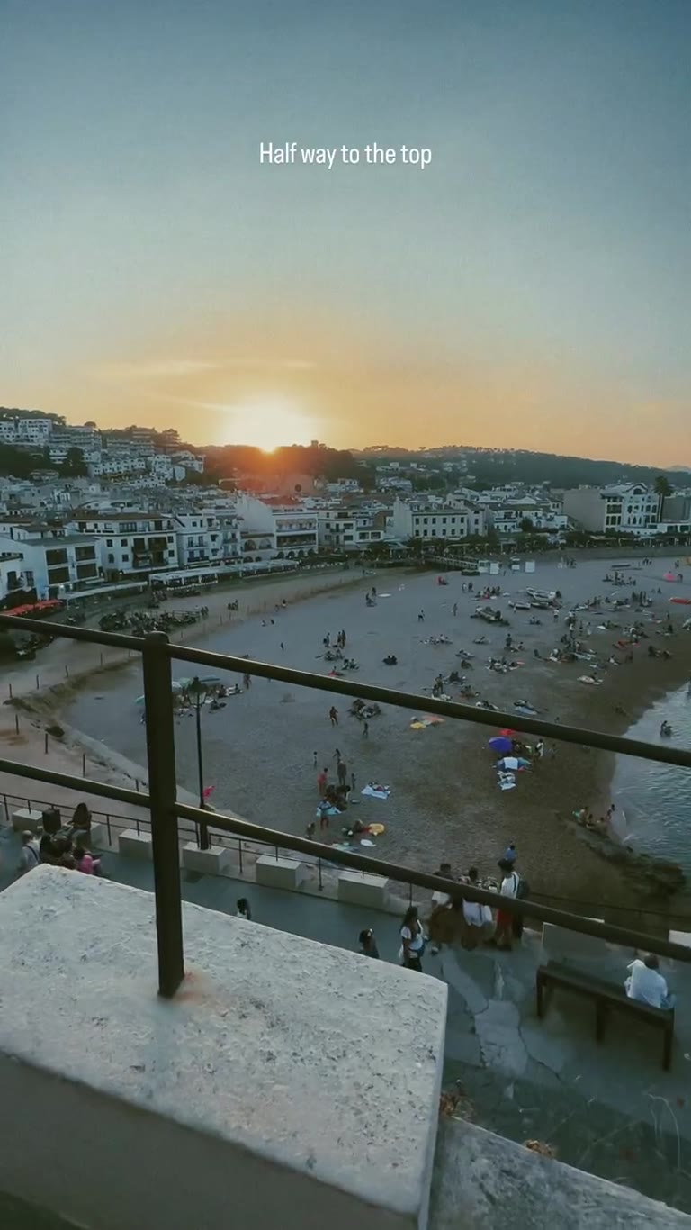 Sunset climb above a Costa Brava beach