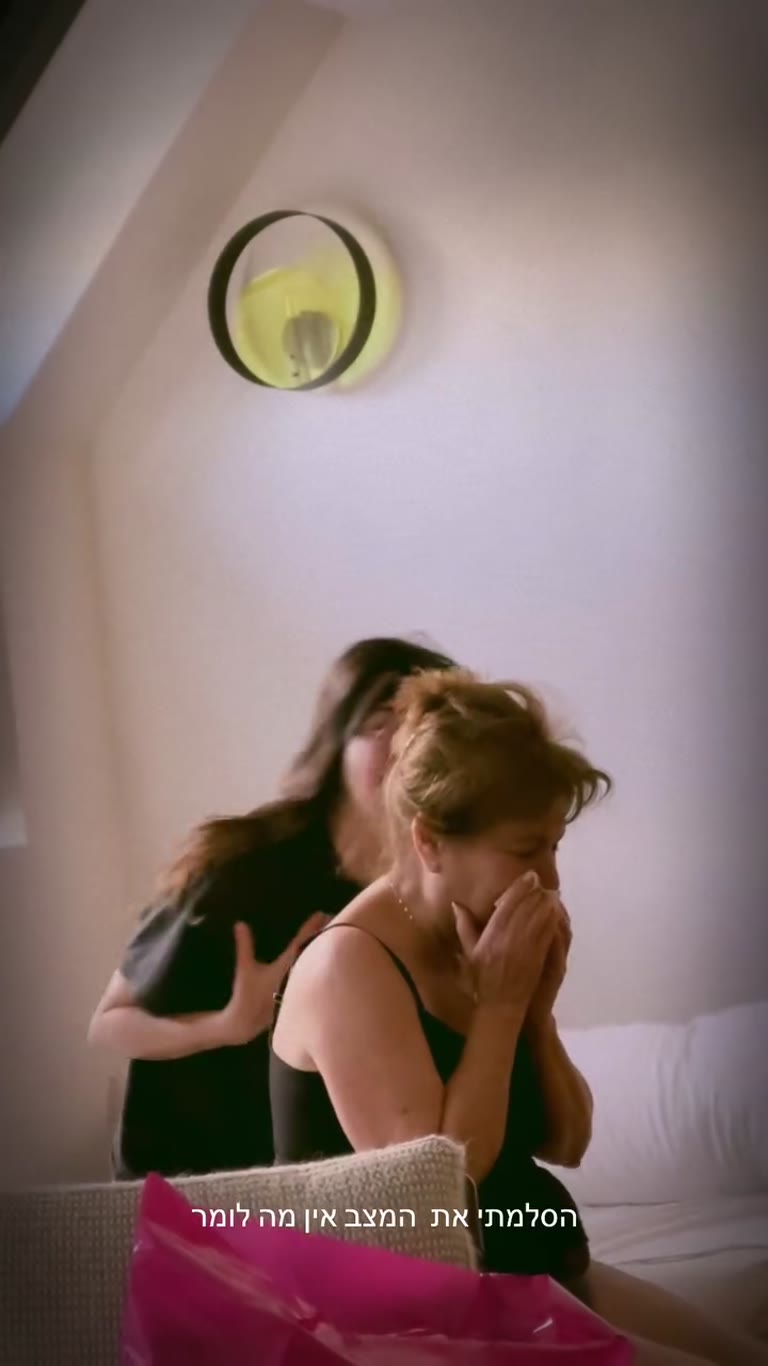 Laughing with mom in the Paris apartment