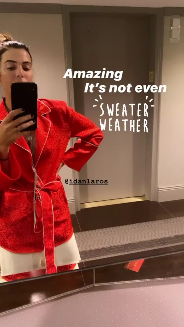 Mirror selfie in a red suit in NYC