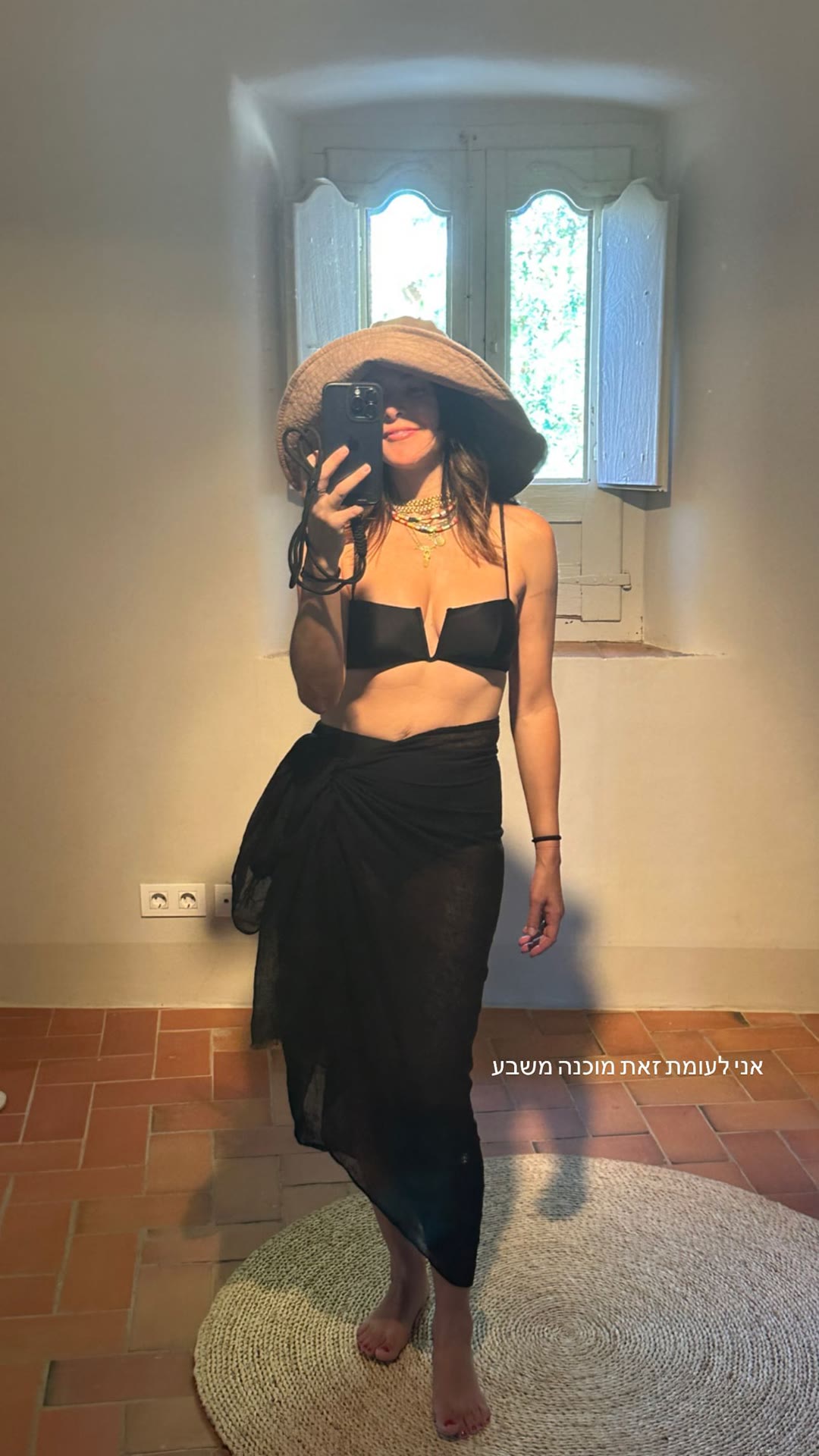 Beach outfit mirror selfie in Spain