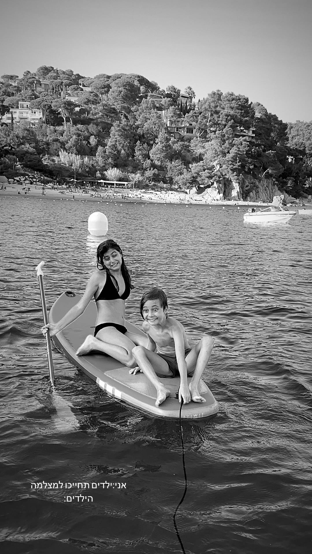 Paddleboarding with the kids in Spain