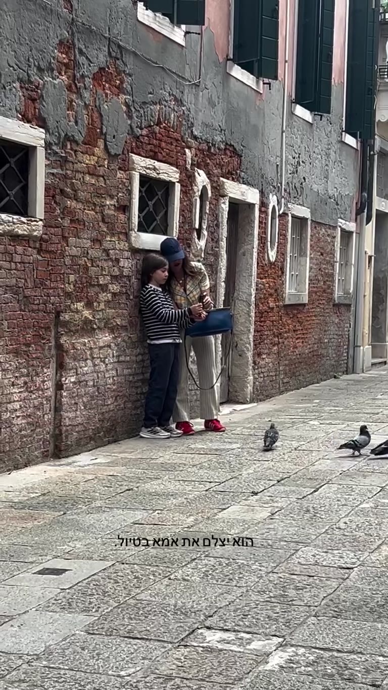 Wandering a quiet Venice alley with the kids
