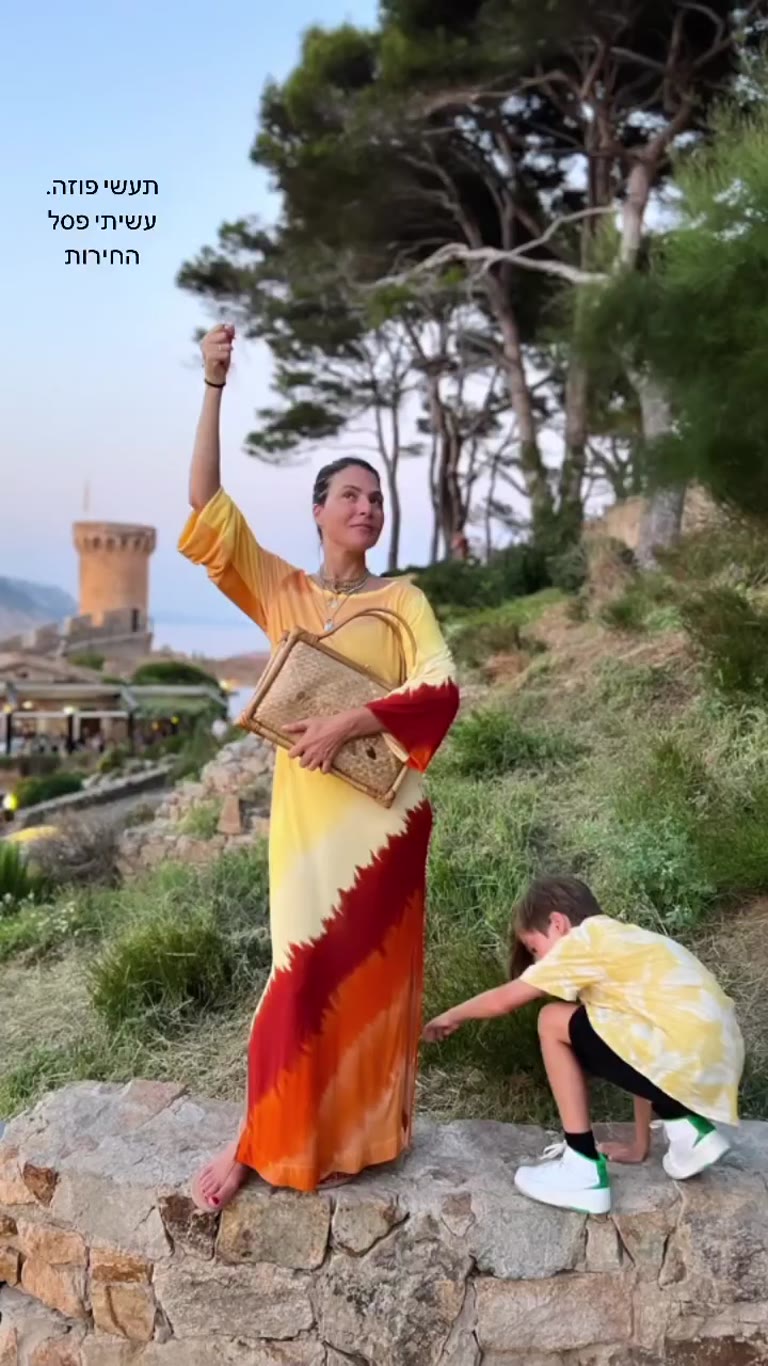 Sunset pose above a Costa Brava fortress