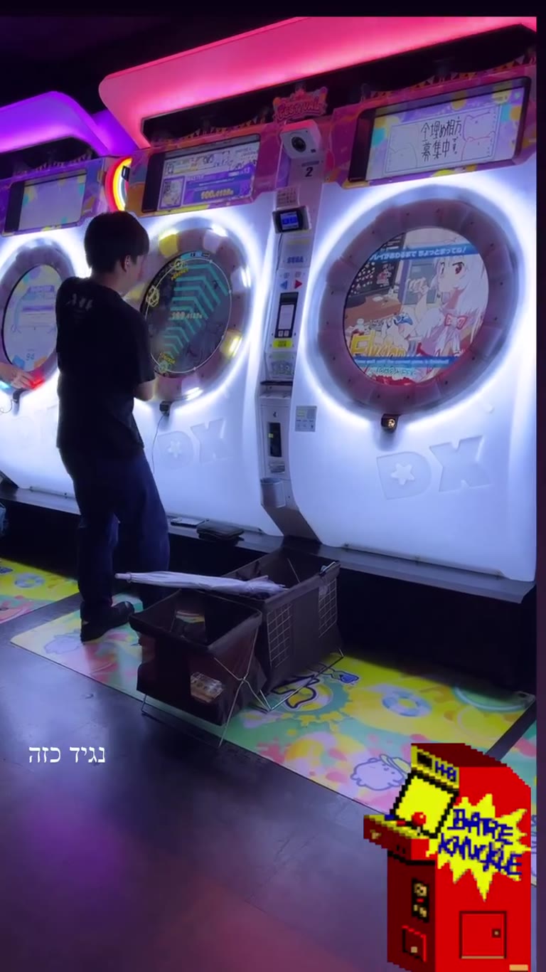 Japanese arcade in Tokyo — maimai DX machines