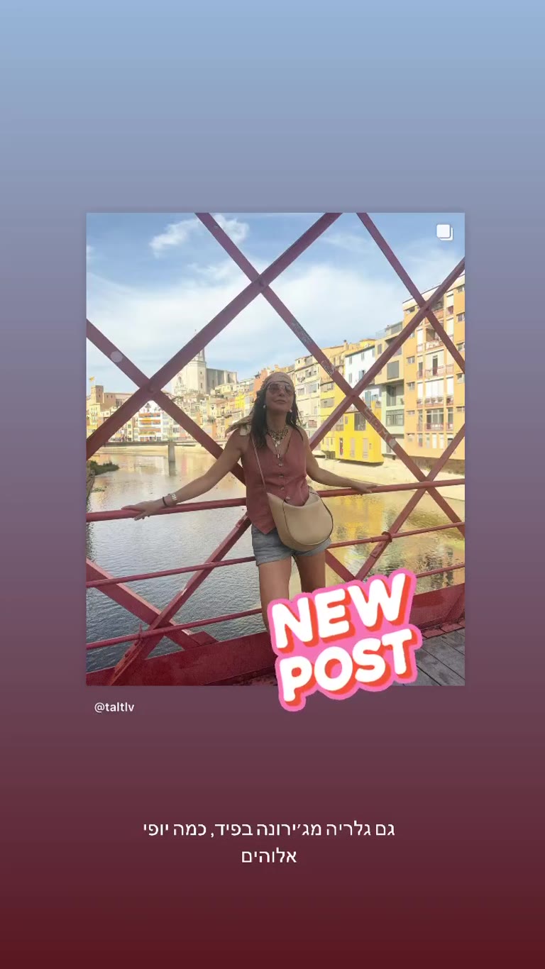 Girona's Eiffel bridge and colorful riverfront