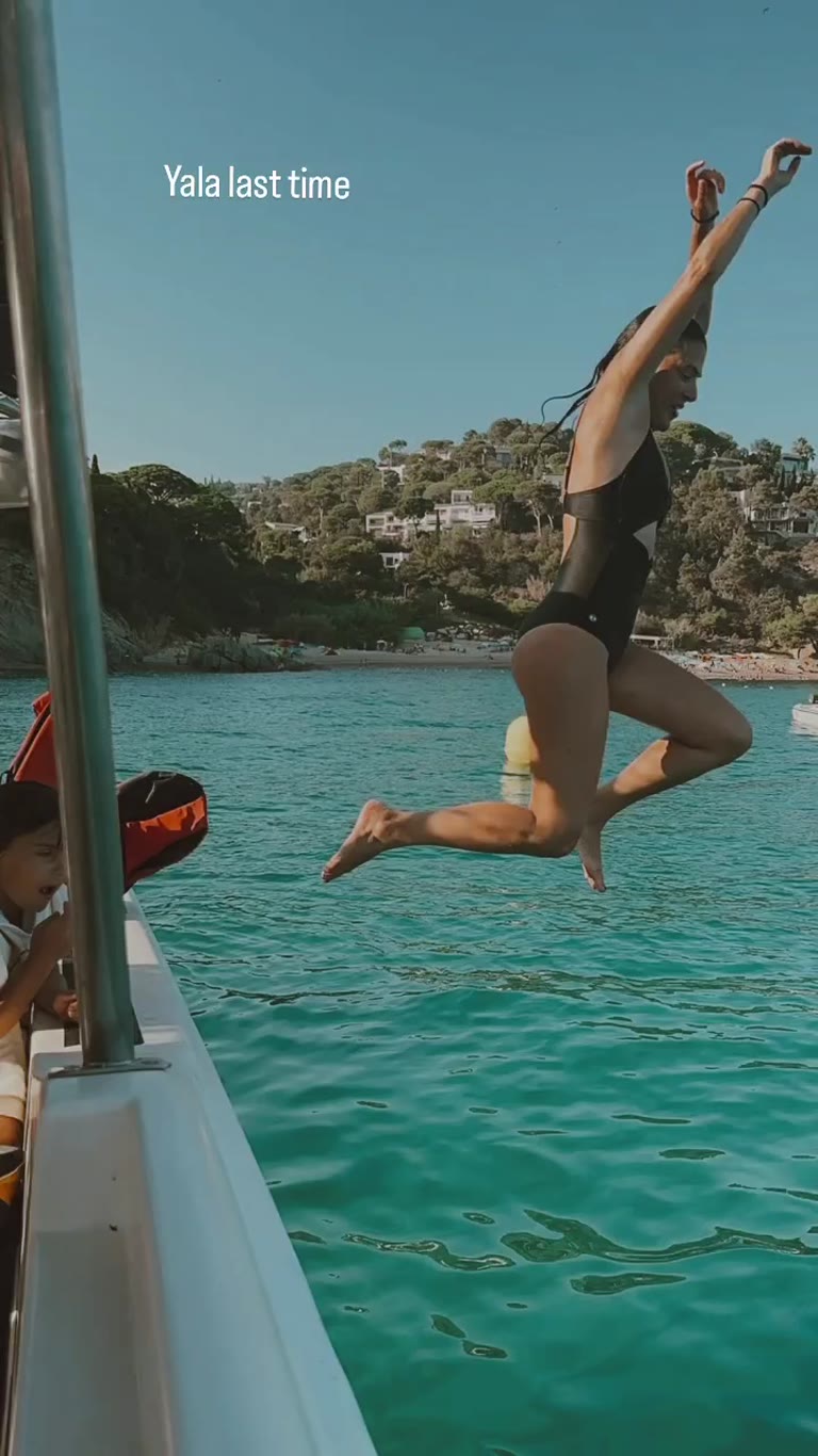 Boat jump into a Costa Brava cove