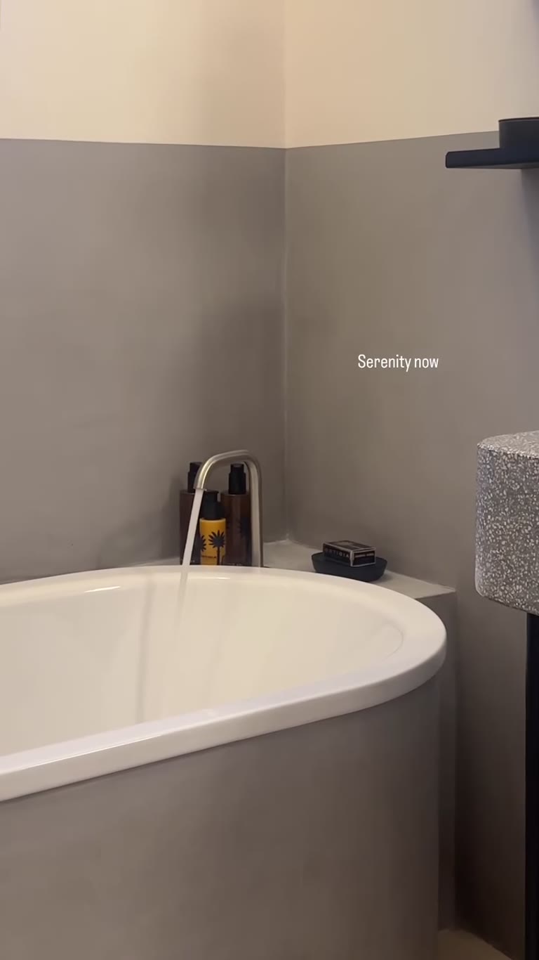 Filling the tub in a Puglia hotel bathroom