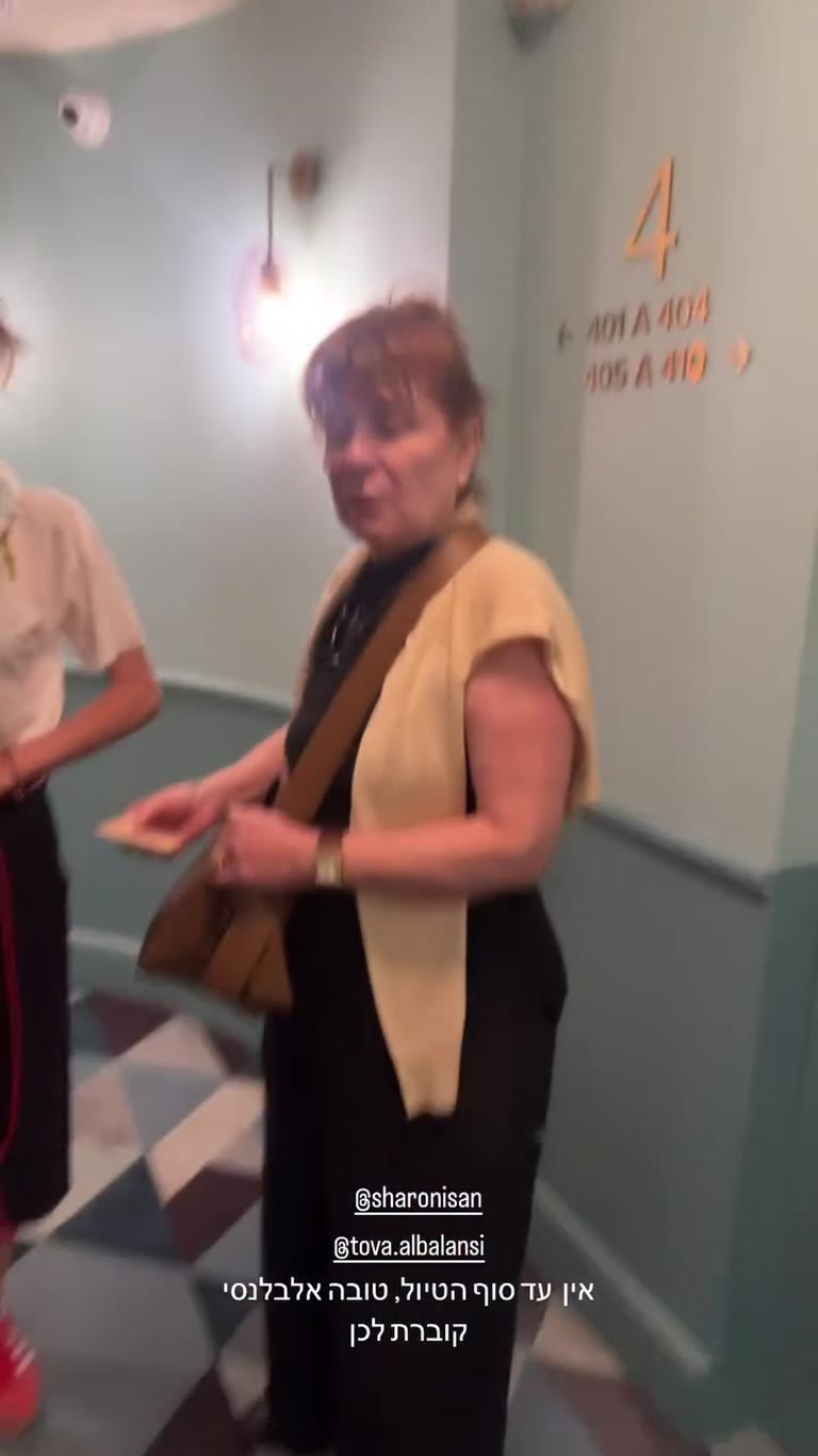 Outfit check with Tova in a Paris hotel hallway