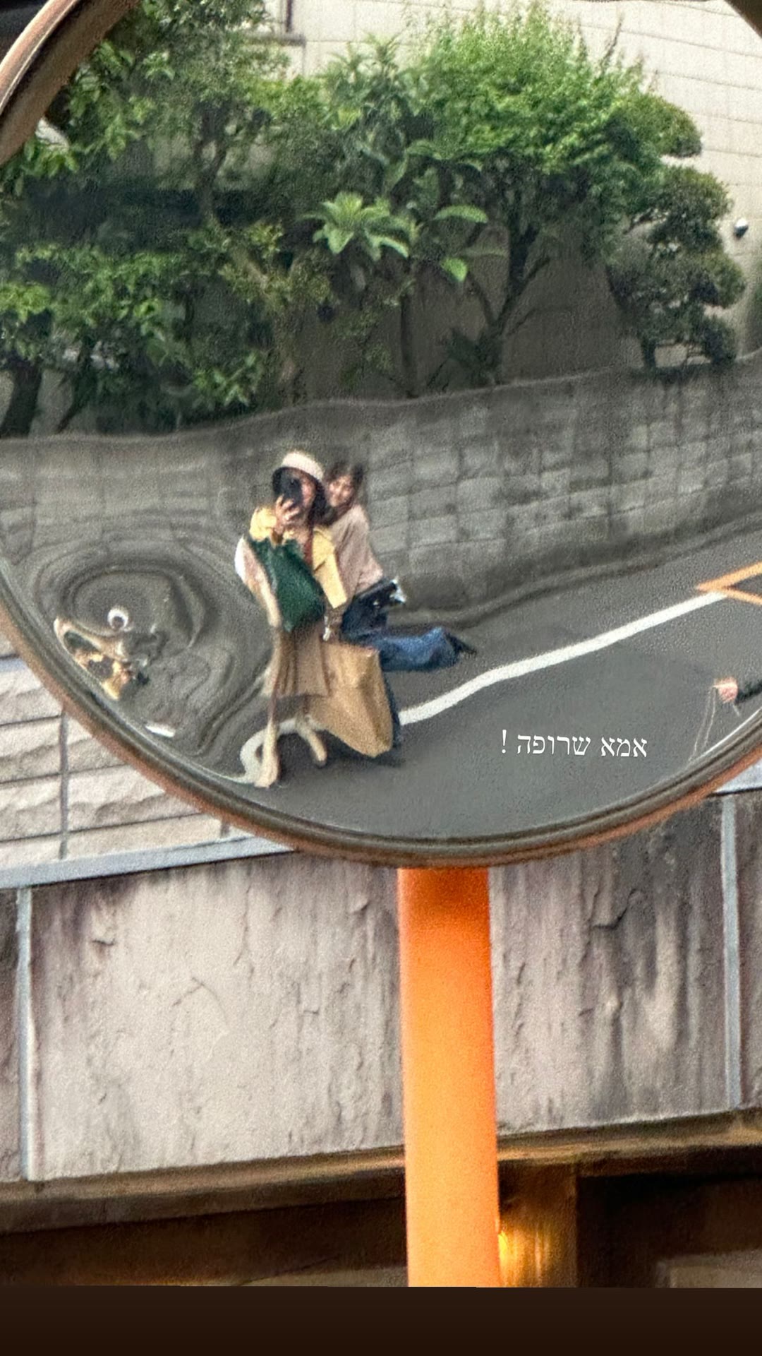 Mirror selfie on a Tokyo side street