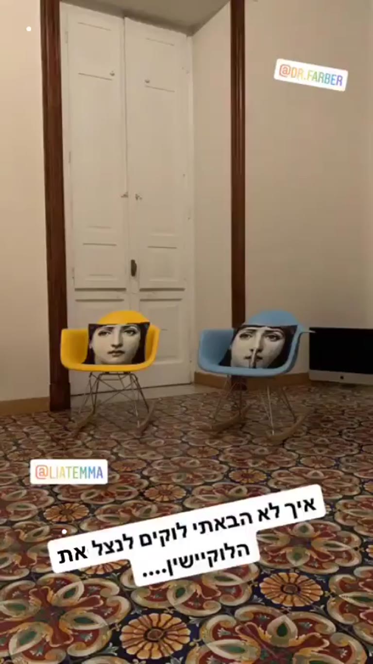 Apartment in Rome with Fornasetti chairs