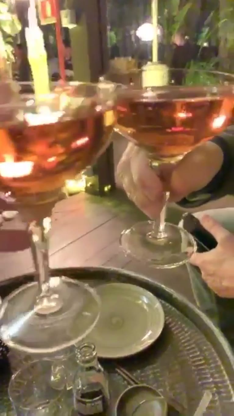 Rosé toast on a candlelit Rome terrace