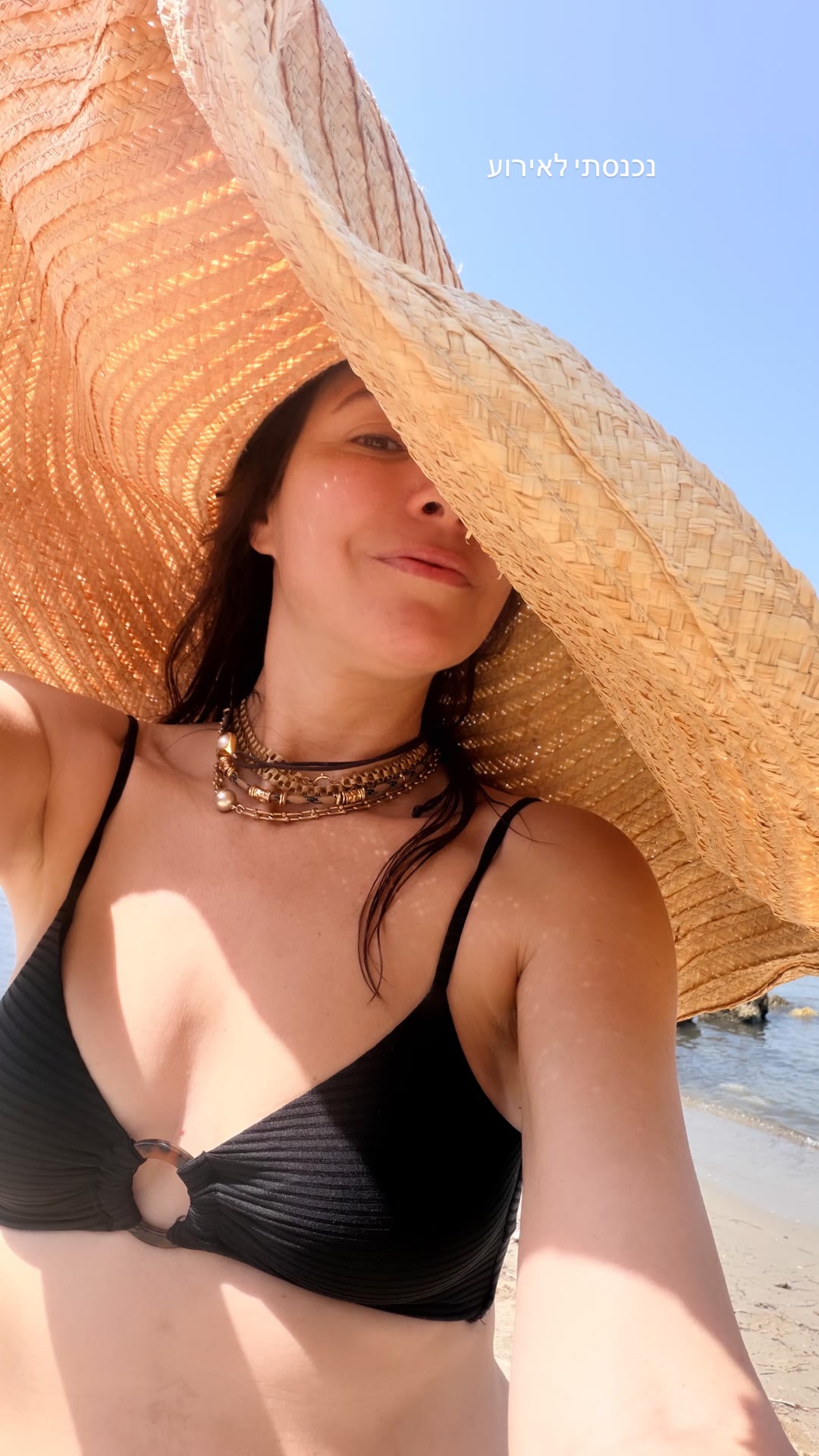 Beach selfie in a giant straw hat, Corfu