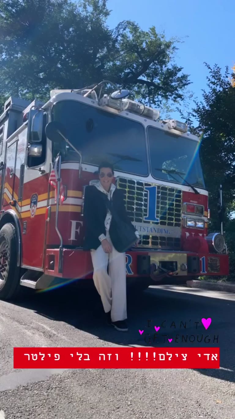 Posing with an FDNY fire truck in NYC