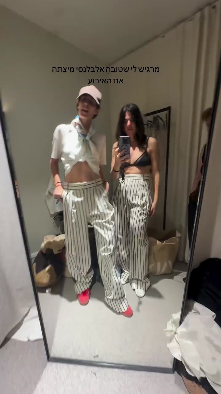 Backstage mirror selfie in a Paris fitting room