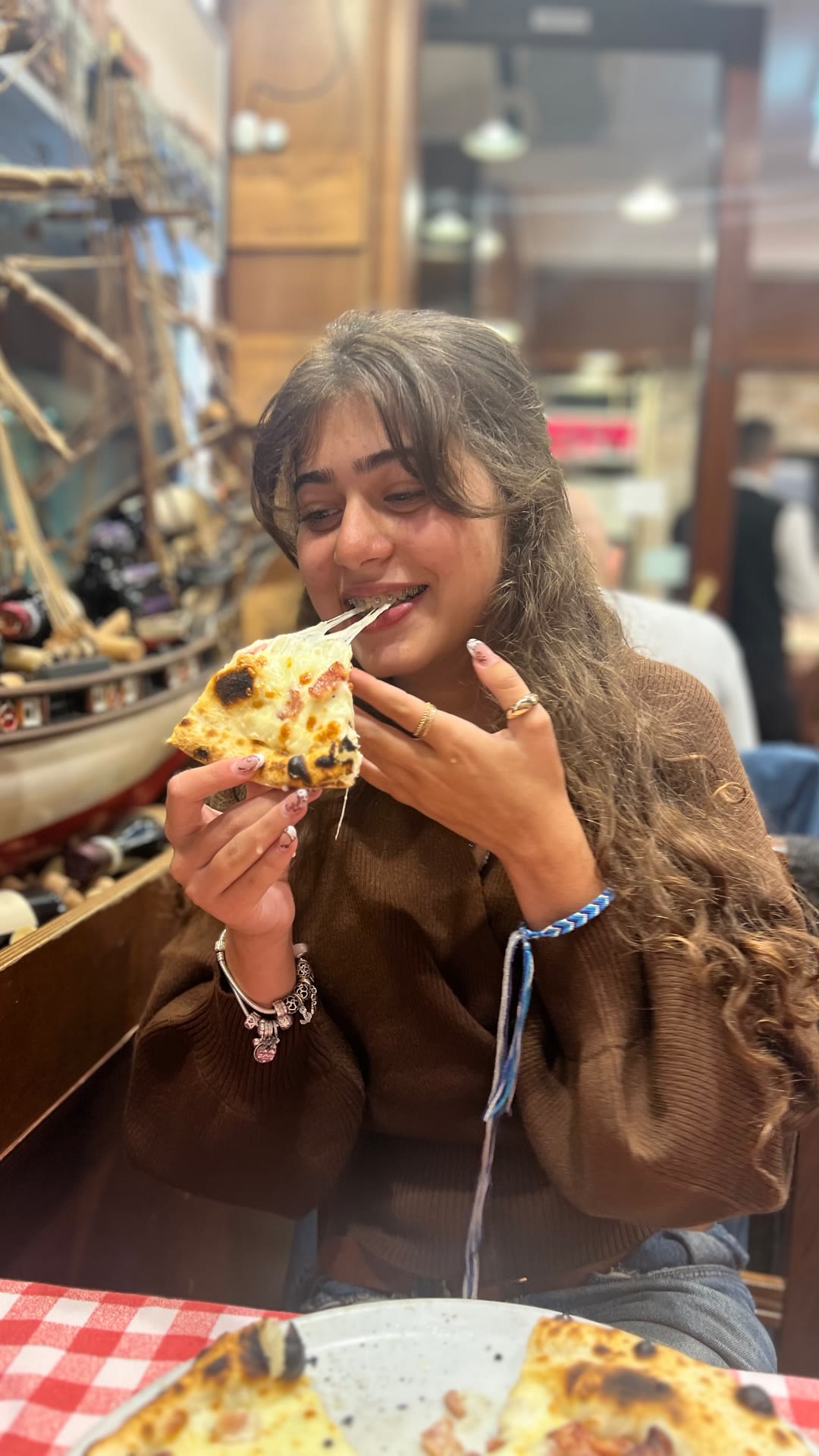 Cheesy pizza slice in Venice