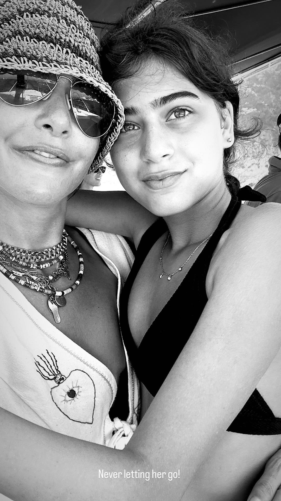 Mother–daughter selfie on a boat in Spain