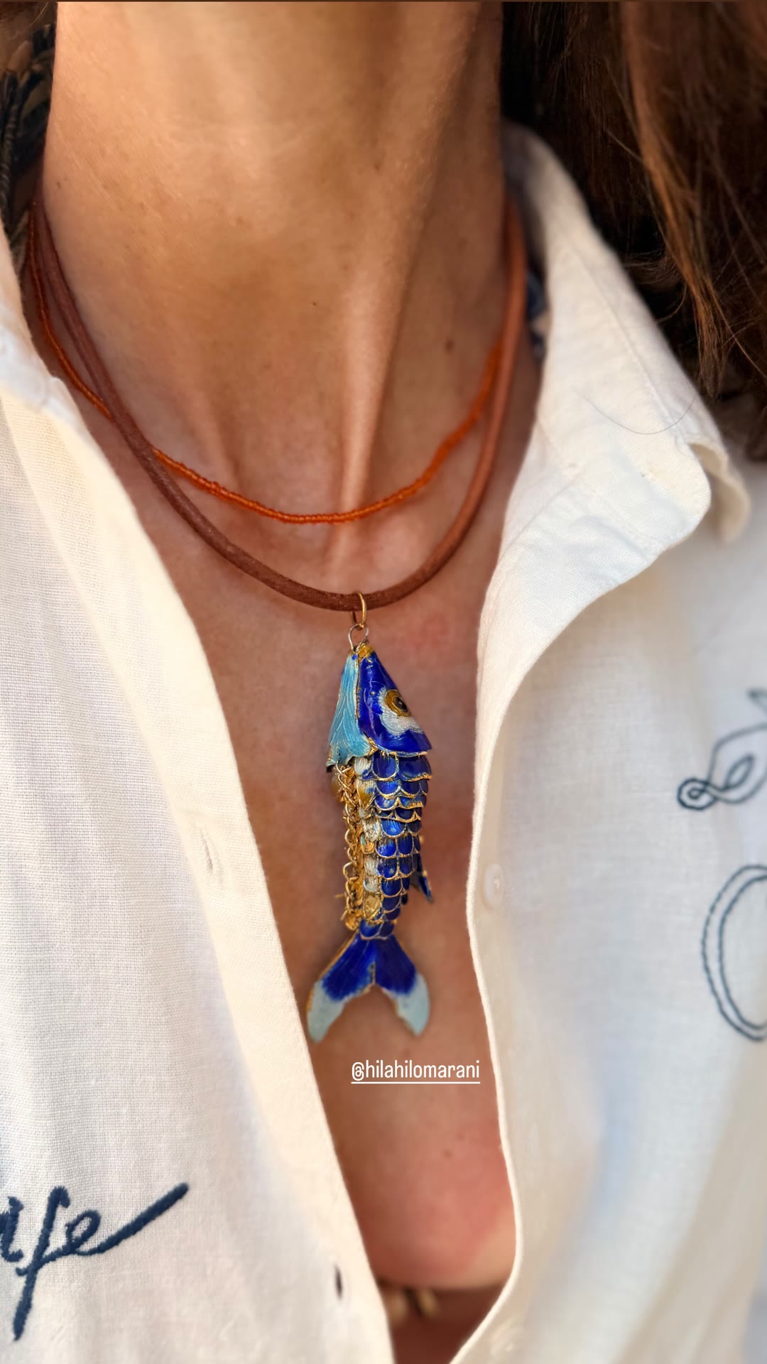 Blue enamel fish necklace by @hilahilomarani