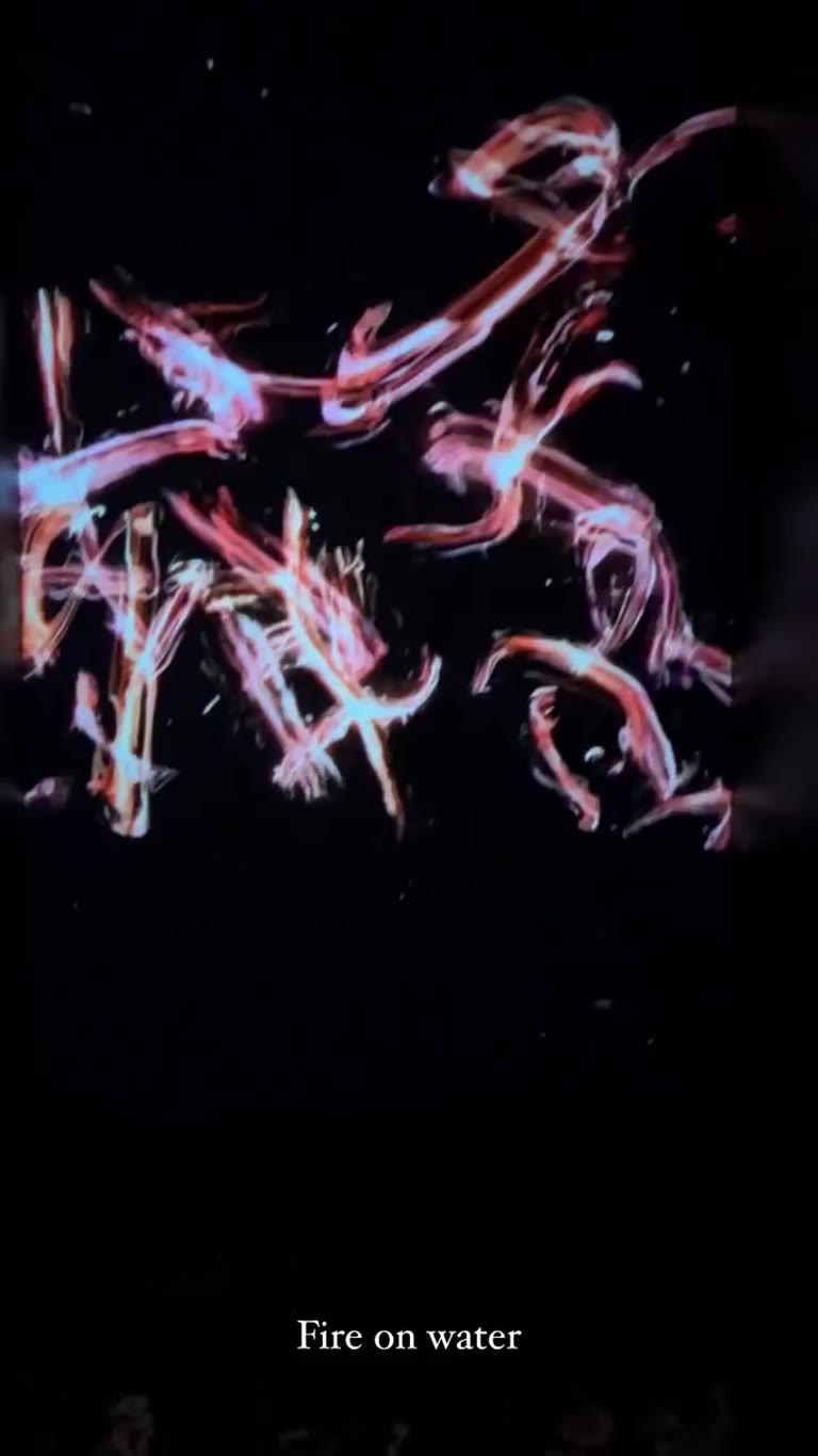 "Fire on water" light-writing art in Tokyo