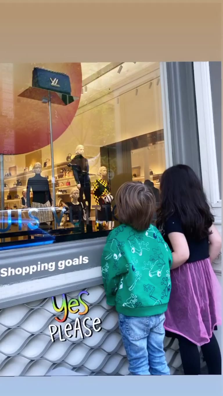 Kids window-shopping at Louis Vuitton, NYC