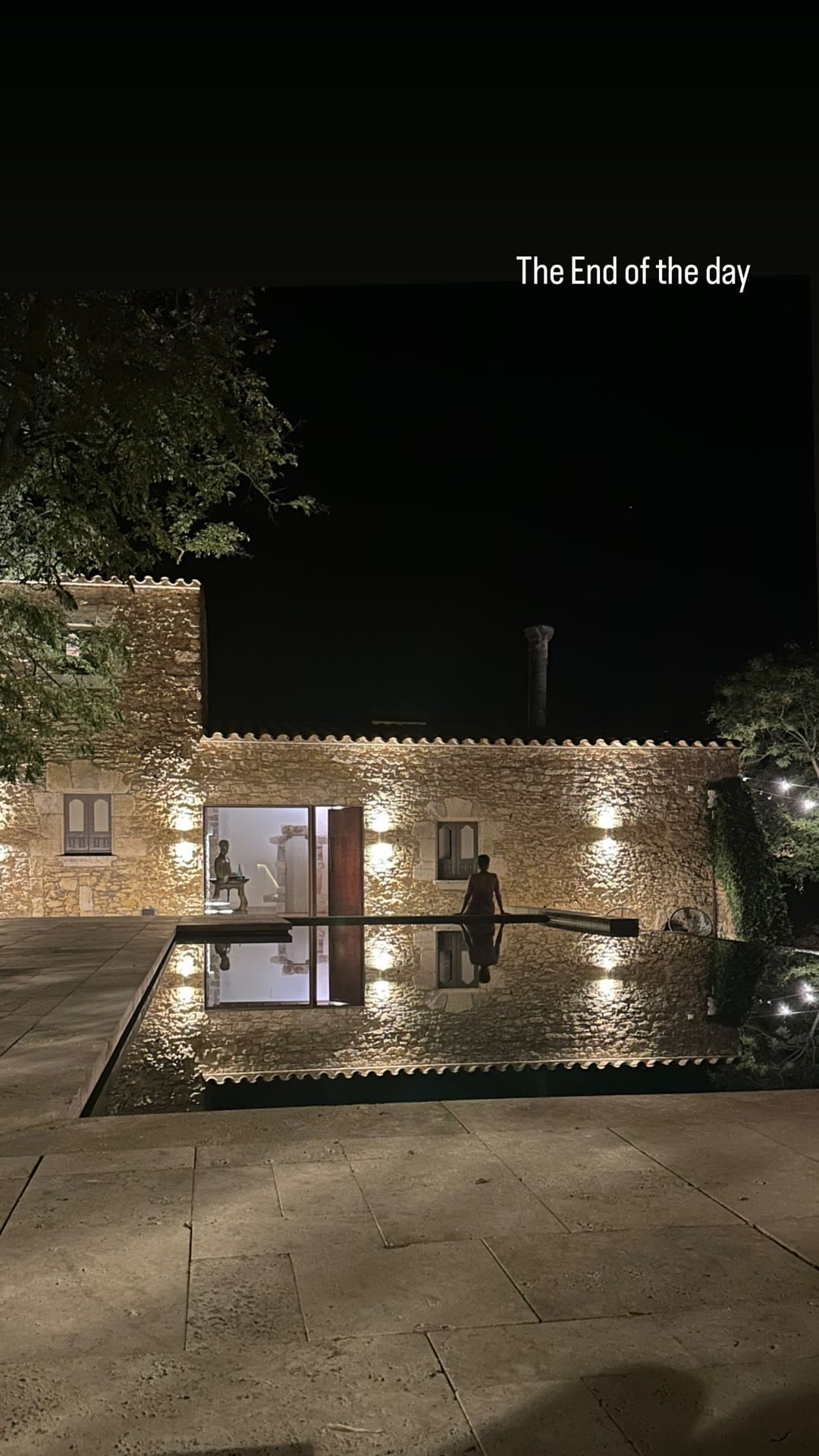 Nighttime by the pool at a Spanish stone villa
